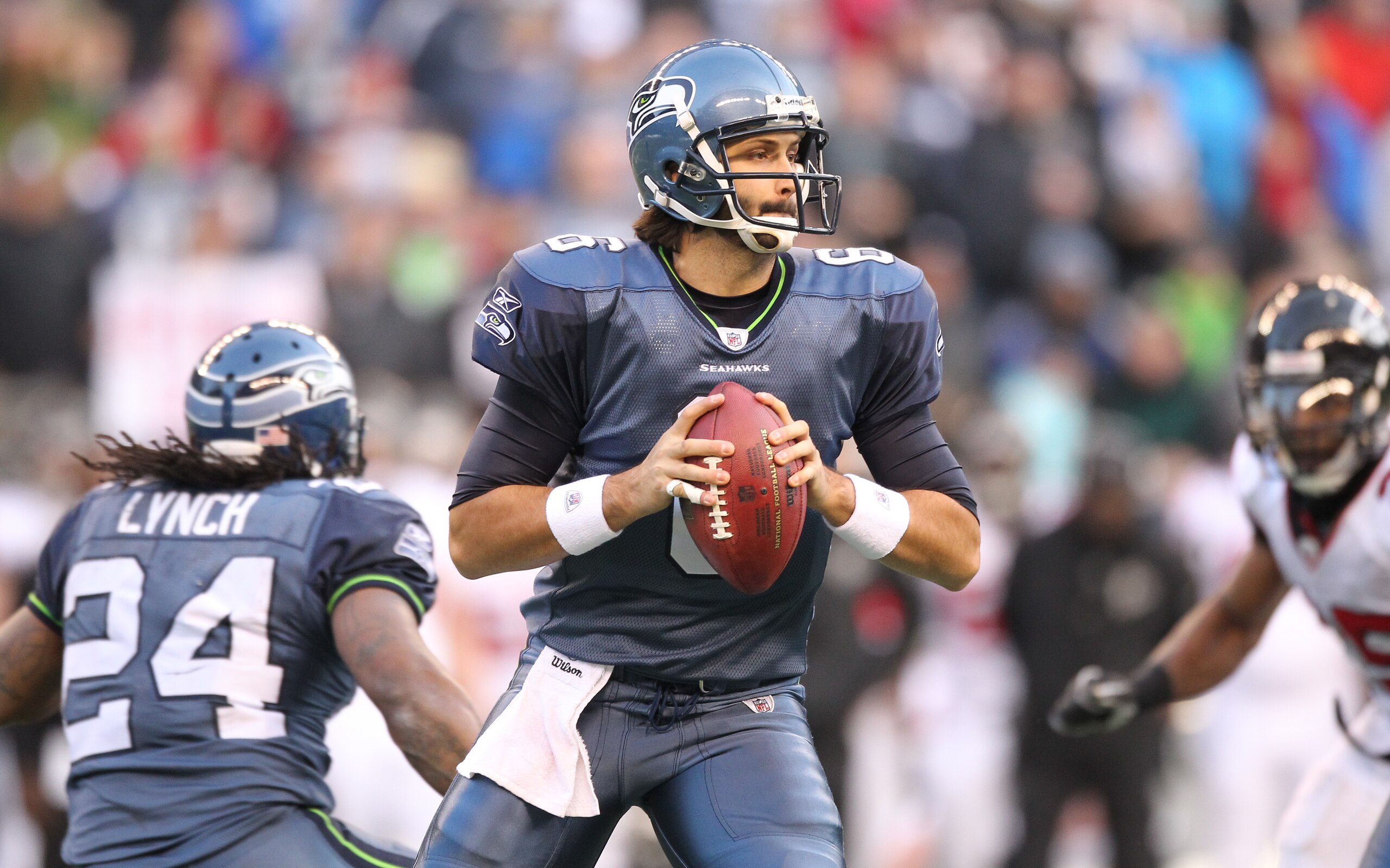 SEATTLE, WA - DECEMBER 19: Quarterback Charlie Whitehurst #6 of the Seattle Seahawks looks to pass against the Atlanta Falcons at Qwest Field on December 19, 2010 in Seattle, Washington. (Photo by Otto Greule Jr/Getty Images) SEATTLE, WA - DECEMBER 19: Quarterback Charlie Whitehurst #6 of the Seattle Seahawks looks to pass against the Atlanta Falcons at Qwest Field on December 19, 2010 in Seattle, Washington. (Photo by Otto Greule Jr/Getty Images)