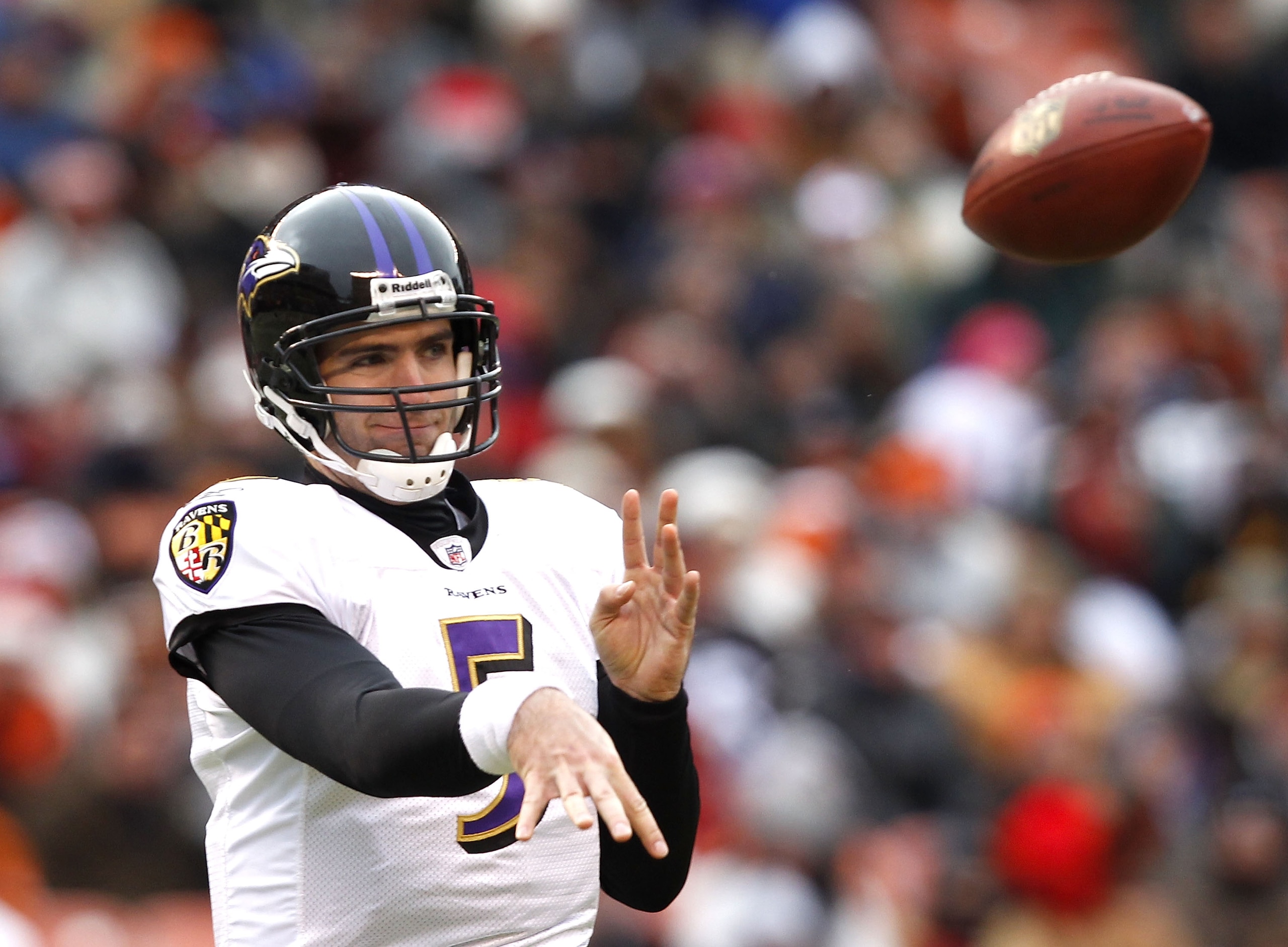 CLEVELAND - DECEMBER 26:  Quarterback Joe Flacco #5 of the Baltimore Ravens throws to a receiver against the Cleveland Browns at Cleveland Browns Stadium on December 26, 2010 in Cleveland, Ohio.  (Photo by Matt Sullivan/Getty Images)