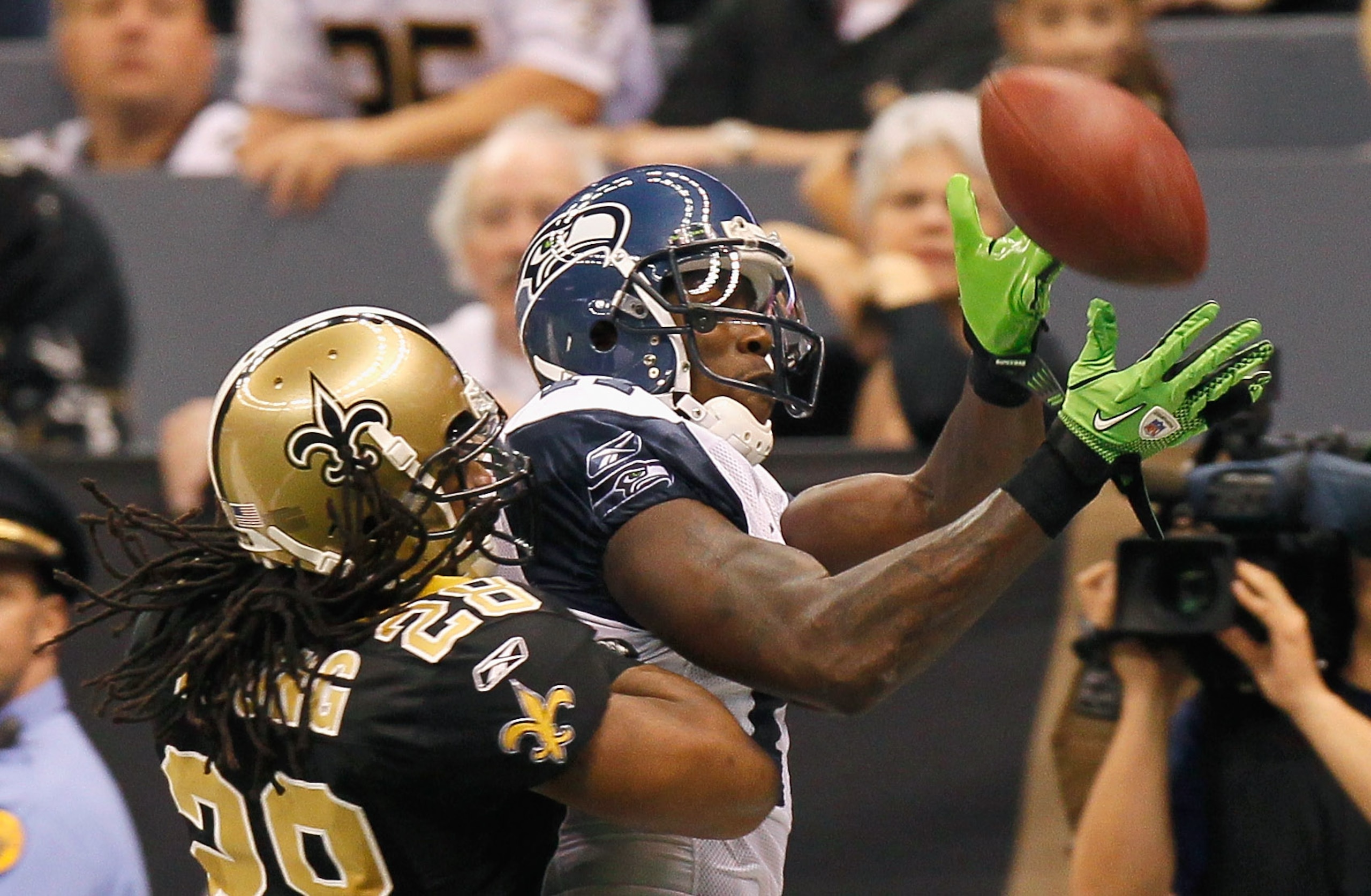 NEW ORLEANS - NOVEMBER 21: Mike Williams #17 of the Seattle Seahawks fails to pull in this touchdown reception against Usama Young #28 of the New Orleans Saints at Louisiana Superdome on November 21, 2010 in New Orleans, Louisiana. (Photo by Kevin C. Co NEW ORLEANS - NOVEMBER 21: Mike Williams #17 of the Seattle Seahawks fails to pull in this touchdown reception against Usama Young #28 of the New Orleans Saints at Louisiana Superdome on November 21, 2010 in New Orleans, Louisiana. (Photo by Kevin C. Co