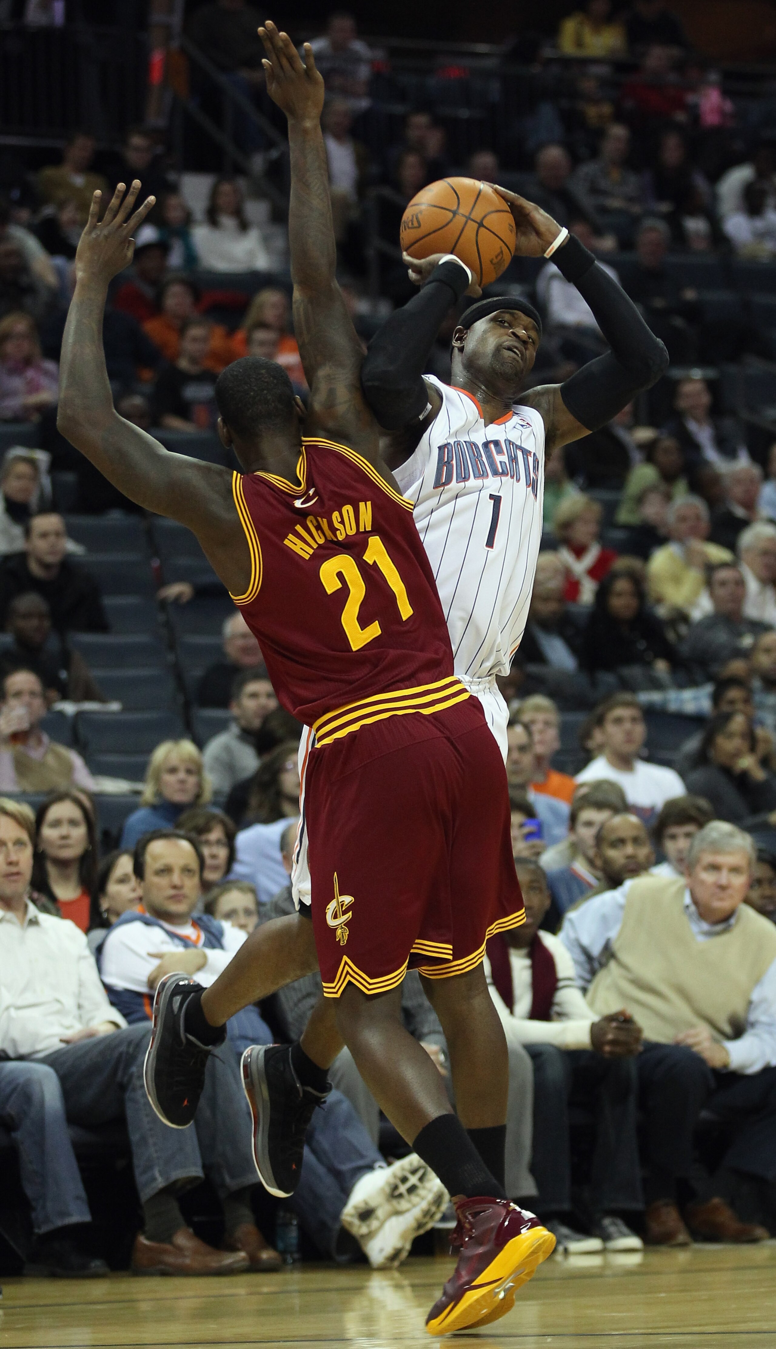 CHARLOTTE, NC - DECEMBER 29: Stephen Jackson #1 of the Charlotte Bobcats is hit as he shoots by J.J. Hickson #21 of the Cleveland Cavaliers during their game at Time Warner Cable Arena on December 29, 2010 in Charlotte, North Carolina. NOTE TO USER: User CHARLOTTE, NC - DECEMBER 29: Stephen Jackson #1 of the Charlotte Bobcats is hit as he shoots by J.J. Hickson #21 of the Cleveland Cavaliers during their game at Time Warner Cable Arena on December 29, 2010 in Charlotte, North Carolina. NOTE TO USER: User