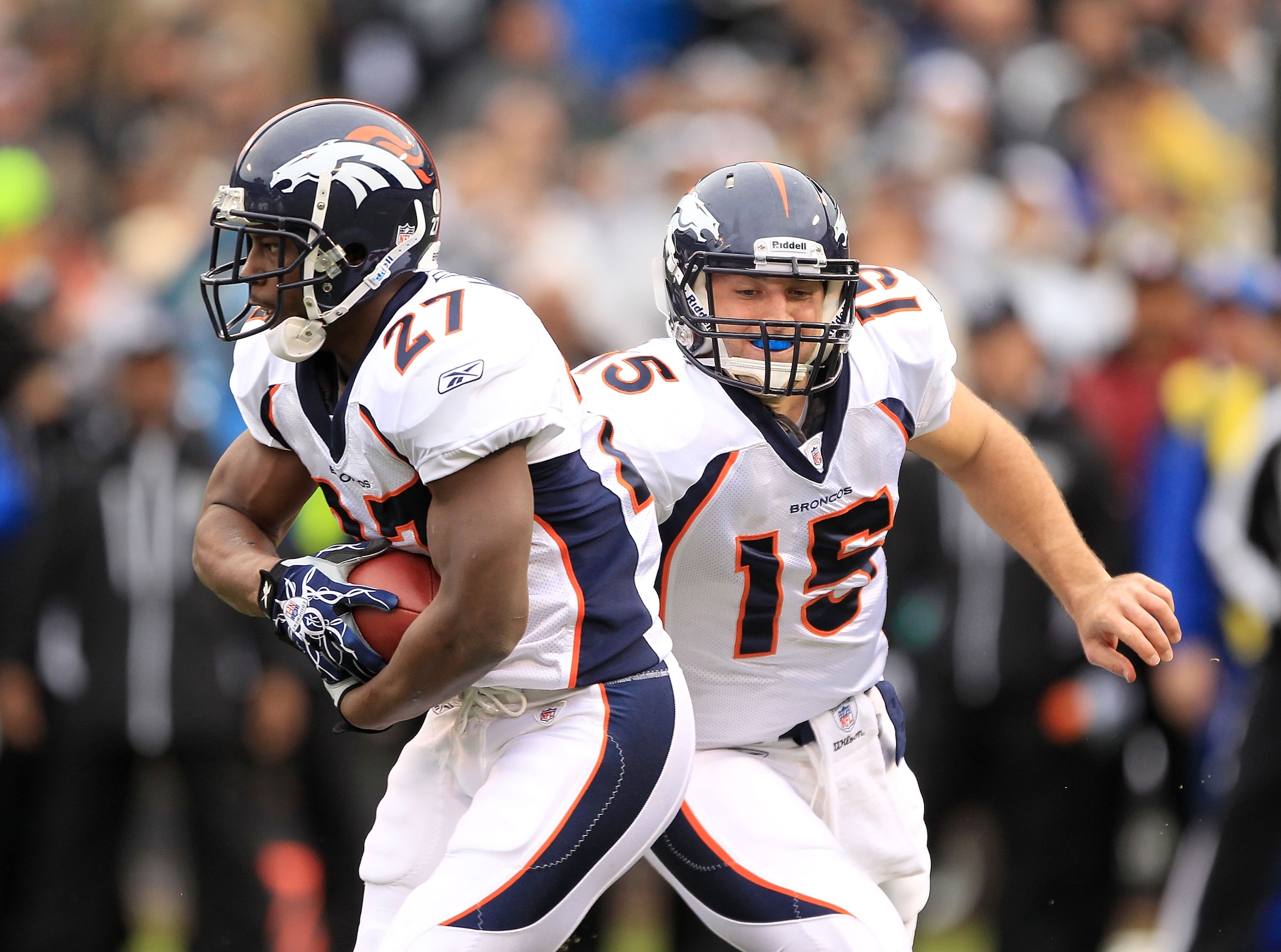 OAKLAND, CA - DECEMBER 19: Tim Tebow #15 of the Denver Broncos hands off to Knowshon Moreno #27 during their game against the Oakland Raiders at Oakland-Alameda County Coliseum on December 19, 2010 in Oakland, California. (Photo by Ezra Shaw/Getty Image OAKLAND, CA - DECEMBER 19: Tim Tebow #15 of the Denver Broncos hands off to Knowshon Moreno #27 during their game against the Oakland Raiders at Oakland-Alameda County Coliseum on December 19, 2010 in Oakland, California. (Photo by Ezra Shaw/Getty Image