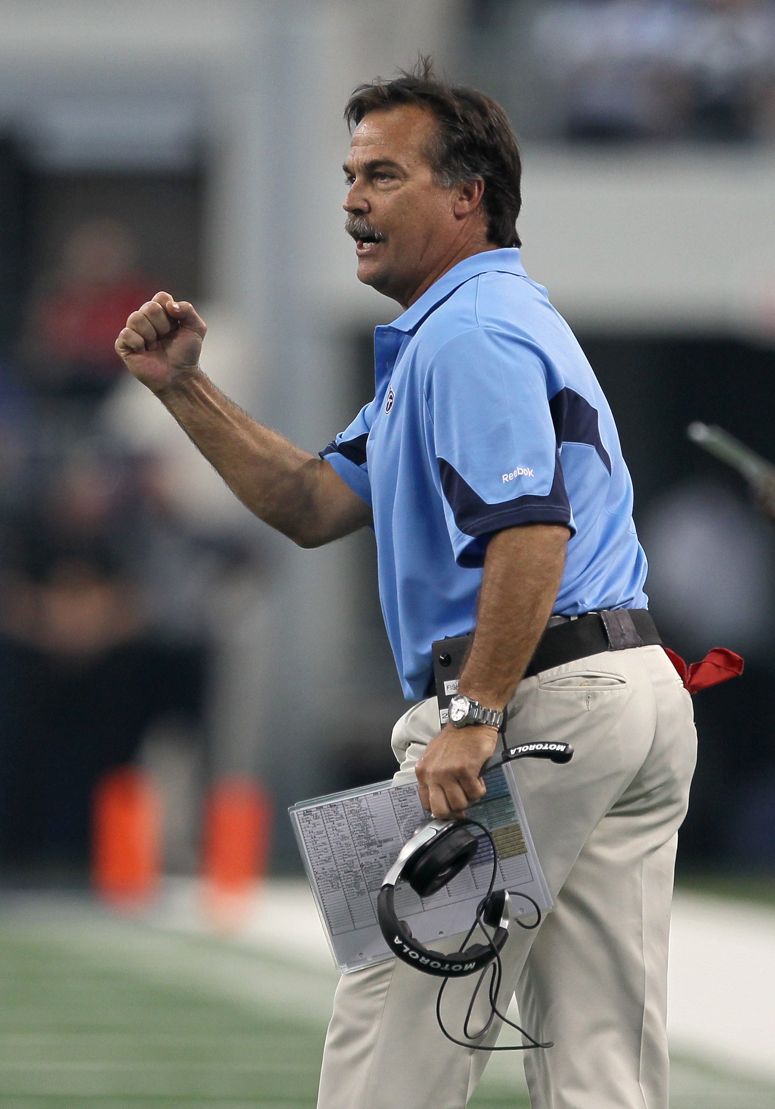ARLINGTON, TX - OCTOBER 10:  Head coach Jeff Fisher of the Tennessee Titans celebrates the Titans second touchdown of the game with the Dallas Cowboys at Cowboys Stadium on October 10, 2010 in Arlington, Texas. The Titans won 34-27.  (Photo by Stephen Dun