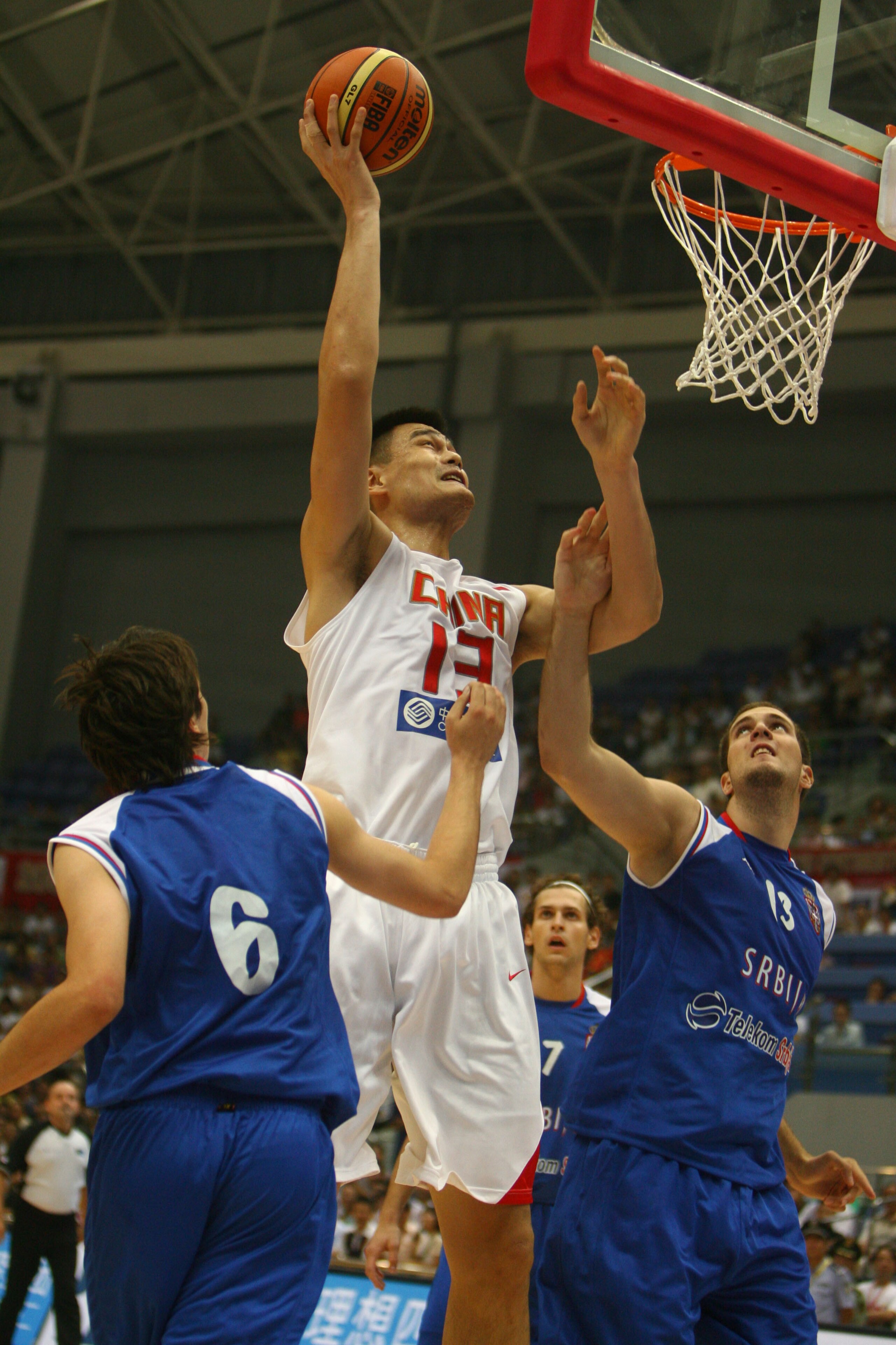 HANGZHOU, CHINA - JULY 17: (CHINA OUT) Petar Despotovic (L) and Miroslav Raduljica (R) of Russia block Yao Ming of China during a match between China and Serbia at the 2008 Stankovic Continental Champions Cup on July 17, 2008 in Hangzhou of Zhejiang Provi HANGZHOU, CHINA - JULY 17: (CHINA OUT) Petar Despotovic (L) and Miroslav Raduljica (R) of Russia block Yao Ming of China during a match between China and Serbia at the 2008 Stankovic Continental Champions Cup on July 17, 2008 in Hangzhou of Zhejiang Provi