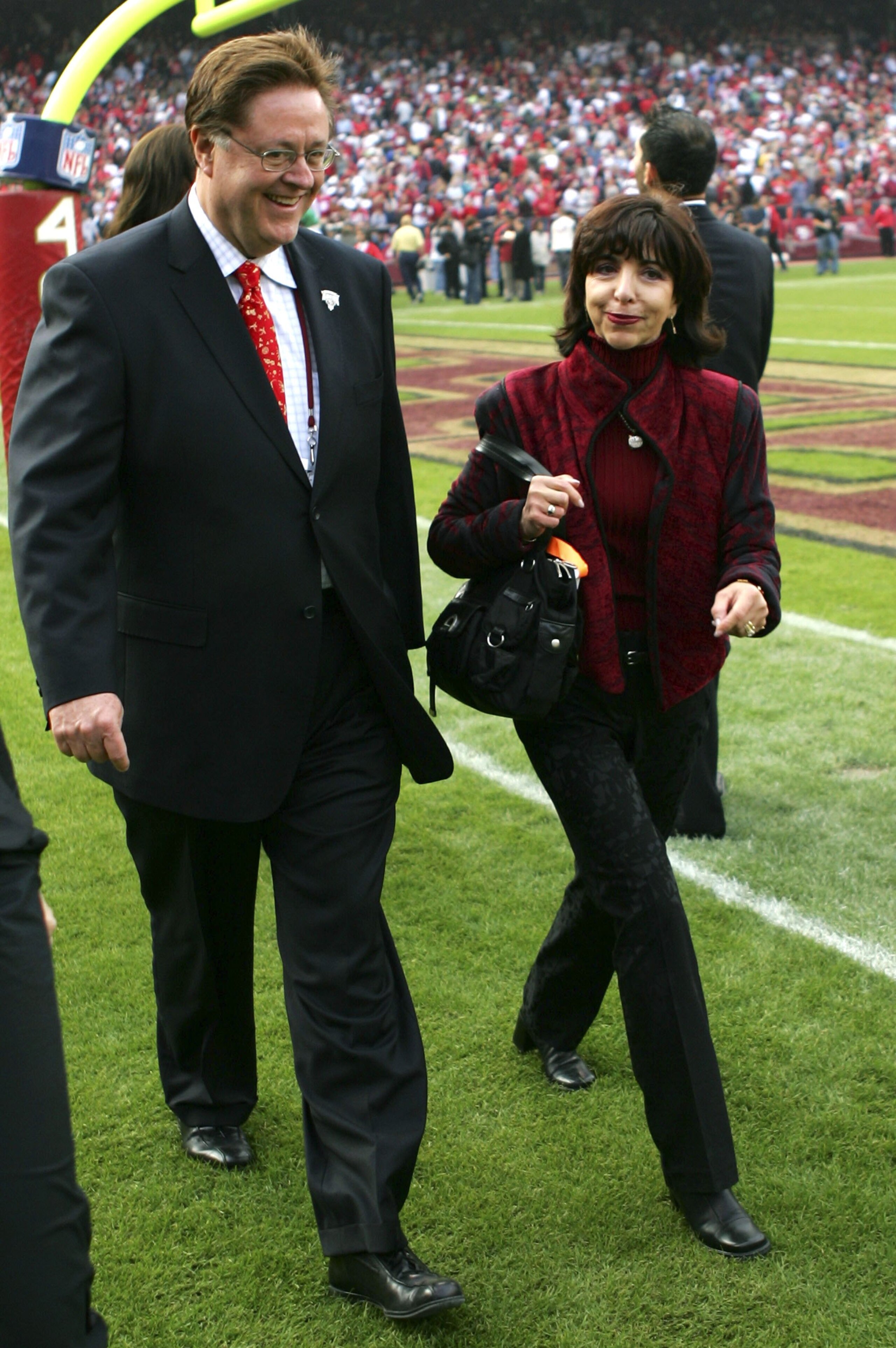 SAN FRANCISCO - NOVEMBER 19:  Dr. John York (L) and Denise DeBartolo York leave the ceremony held in Jerry Rice's honor during half time of the NFL game between the San Francisco 49ers and the Seattle Seahawks at Monster Park on November 19, 2006 in San F