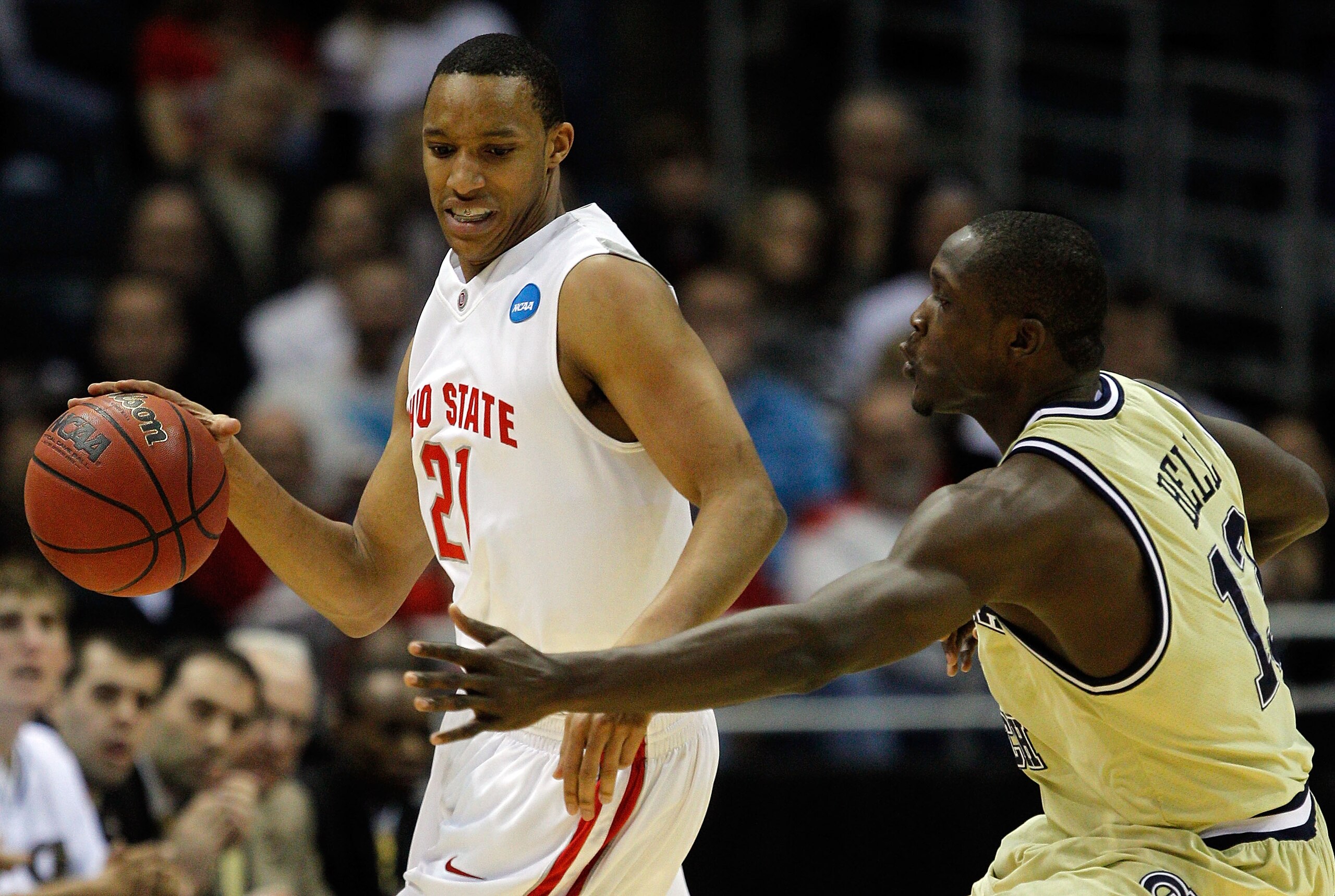 MILWAUKEE - MARCH 21: Evan Turner #21 of the Ohio State Buckeyes moves the ball as he is covered by D'Andre Bell #13 of the Georgia Tech Yellow Jackets in the first half during the second round of the 2010 NCAA men's basketball tournament at the Bradley MILWAUKEE - MARCH 21: Evan Turner #21 of the Ohio State Buckeyes moves the ball as he is covered by D'Andre Bell #13 of the Georgia Tech Yellow Jackets in the first half during the second round of the 2010 NCAA men's basketball tournament at the Bradley