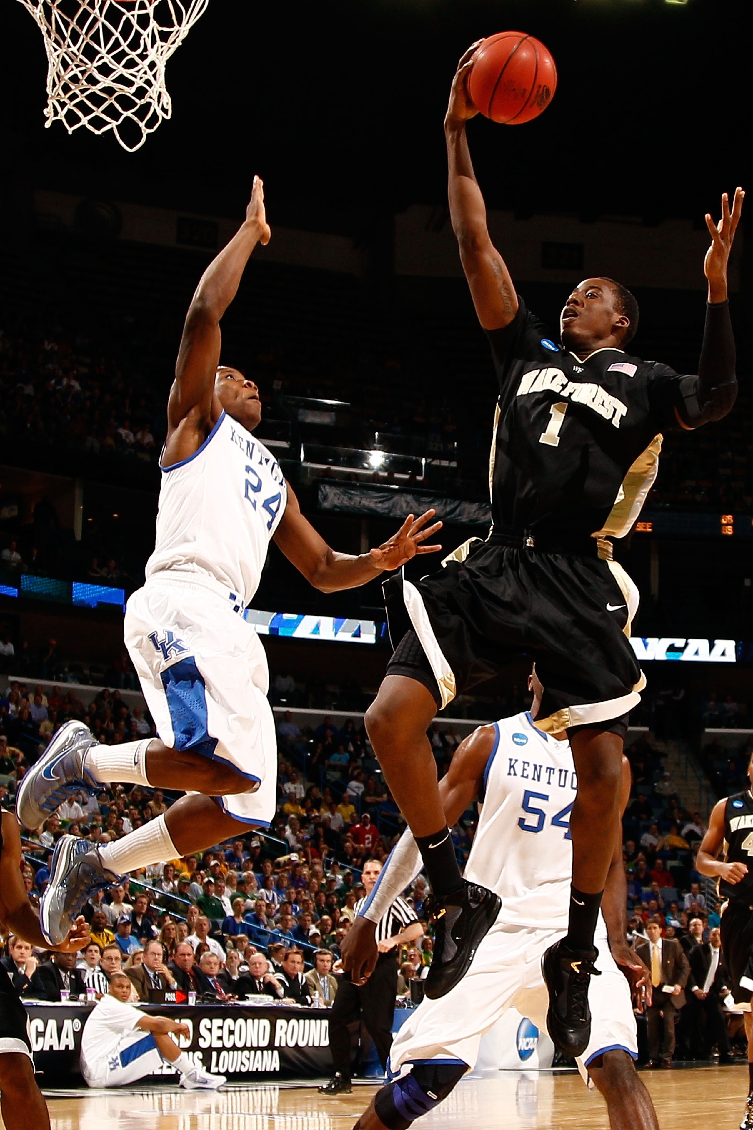 NEW ORLEANS - MARCH 20: Al-Farouq Aminu #1 of the Wake Forest Demon Deacons makes a shot over Eric Bledsoe #24 of the Kentucky Wildcats during the second round of the 2010 NCAA men's basketball tournament at the New Orleans Arena on March 20, 2010 in New NEW ORLEANS - MARCH 20: Al-Farouq Aminu #1 of the Wake Forest Demon Deacons makes a shot over Eric Bledsoe #24 of the Kentucky Wildcats during the second round of the 2010 NCAA men's basketball tournament at the New Orleans Arena on March 20, 2010 in New