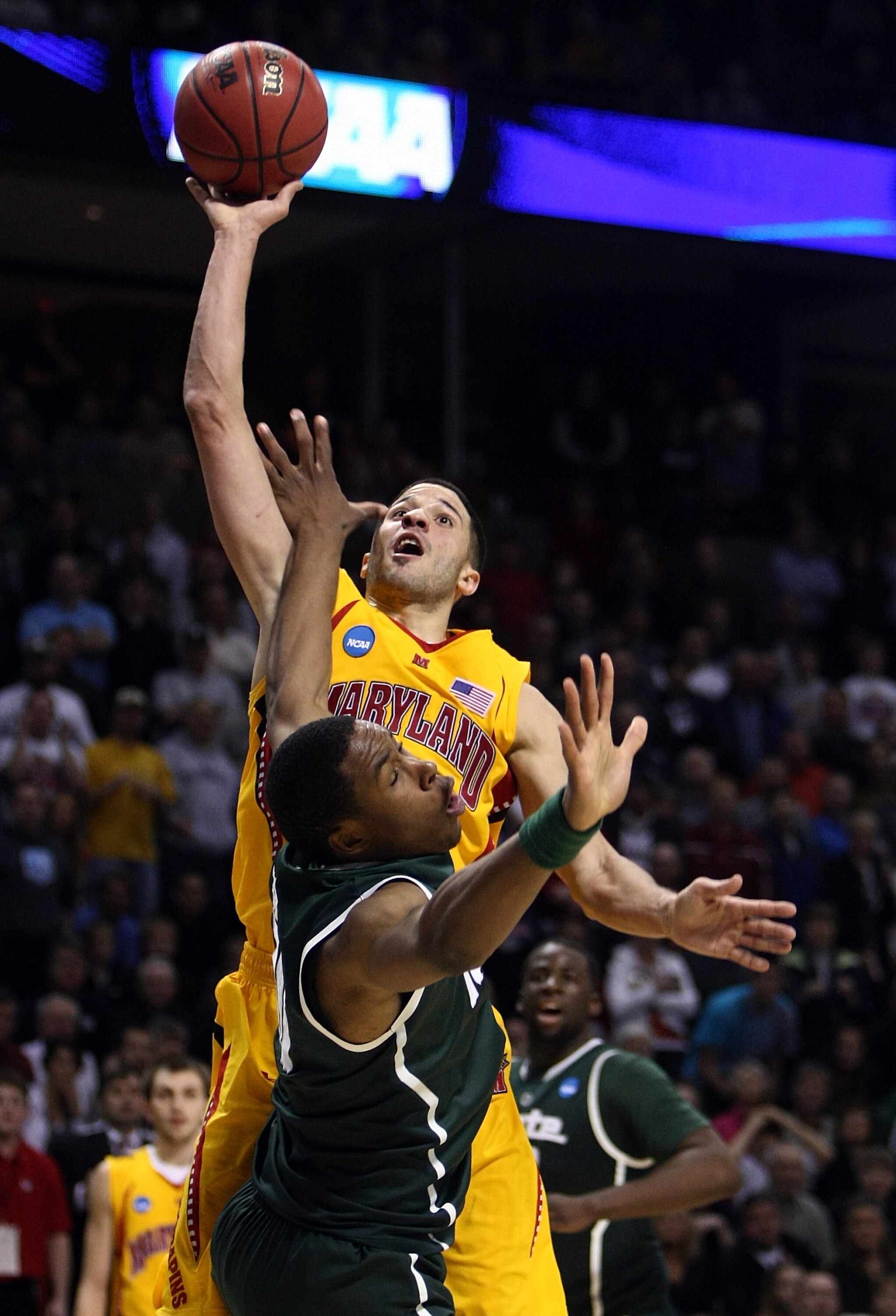 SPOKANE, WA - MARCH 21:  Greivis Vasquez #21 of the Maryland Terrapins shoots over Delvon Roe #10 of the Michigan State Spartans during the second round of the 2010 NCAA men's basketball tournament at Spokane Arena on March 21, 2010 in Spokane, Washington