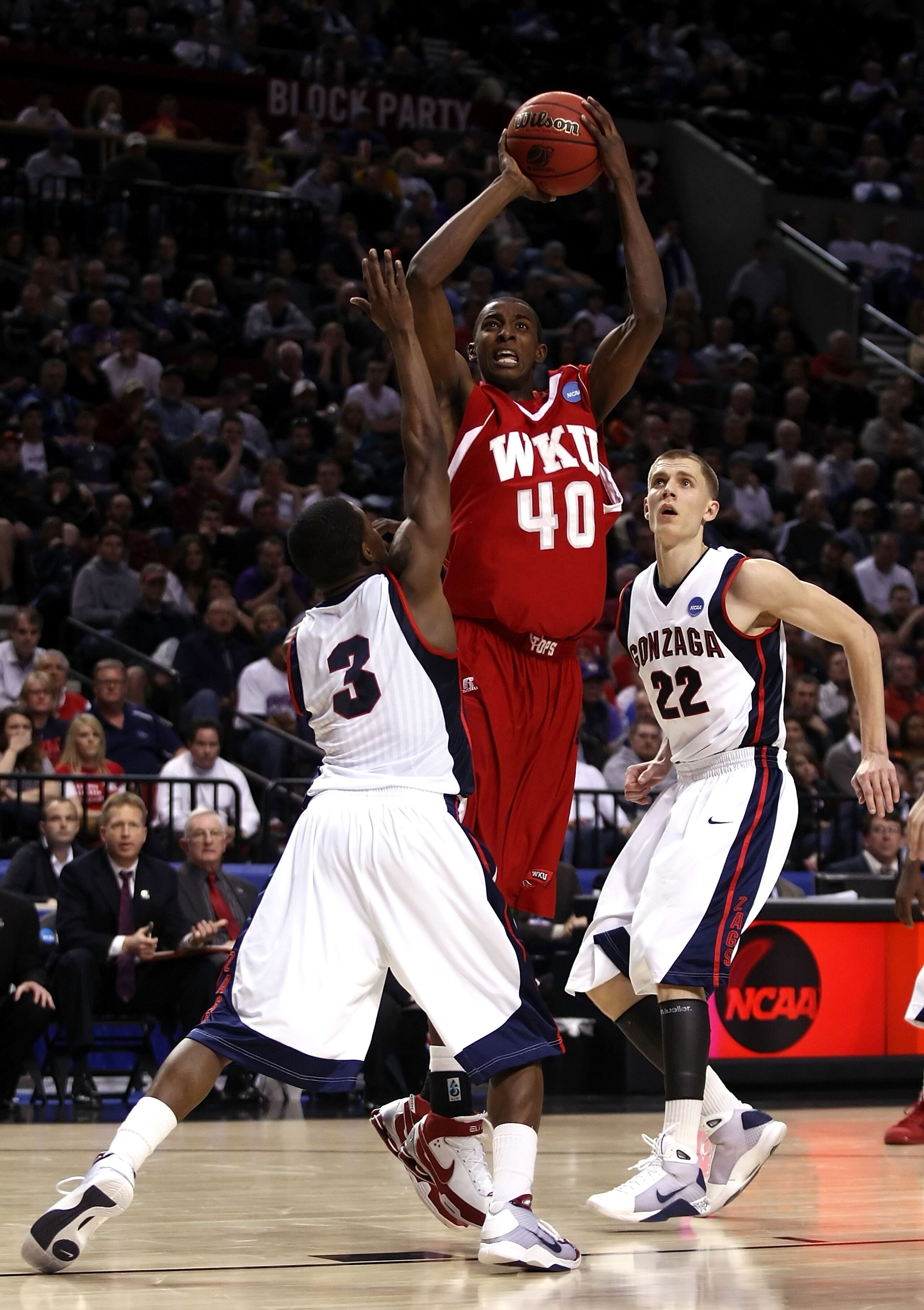 PORTLAND, OR - MARCH 21: Jeremy Evans #40 of the Western Kentucky Hilltoppers goes up for a shot against Demetri Goodson #3 and Micah Downs #22 of the Gonzaga Bulldogs in the first half during the second round of the NCAA Division I Men's Basketball Tour PORTLAND, OR - MARCH 21: Jeremy Evans #40 of the Western Kentucky Hilltoppers goes up for a shot against Demetri Goodson #3 and Micah Downs #22 of the Gonzaga Bulldogs in the first half during the second round of the NCAA Division I Men's Basketball Tour