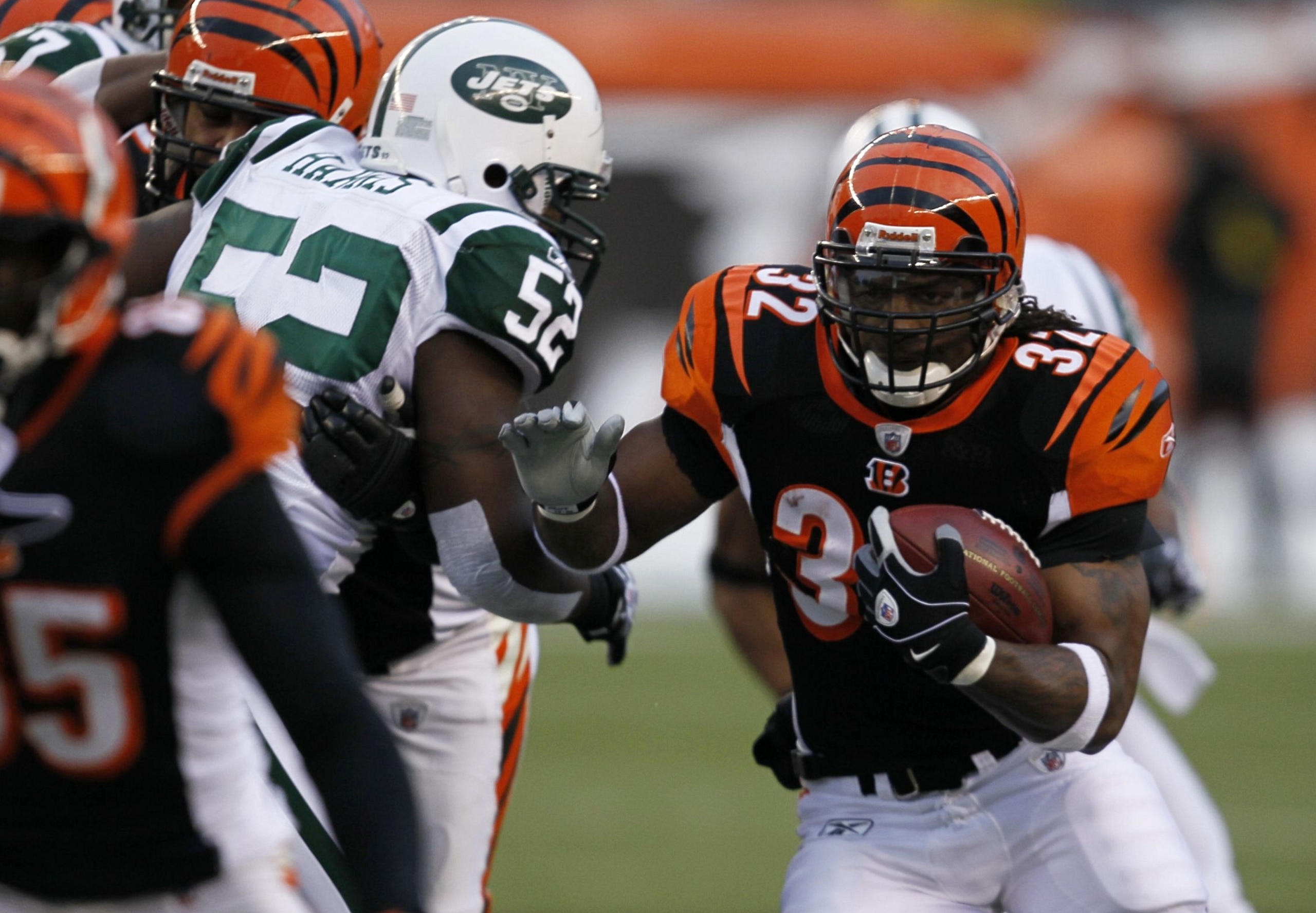 CINCINNATI - JANUARY 9: Cedric Benson #32 of the Cincinnati Bengals runs the ball in the first quarter against the New York Jets during the 2010 AFC wild-card playoff game at Paul Brown Stadium on January 9, 2010 in Cincinnati, Ohio. (Photo by Jonathan D CINCINNATI - JANUARY 9: Cedric Benson #32 of the Cincinnati Bengals runs the ball in the first quarter against the New York Jets during the 2010 AFC wild-card playoff game at Paul Brown Stadium on January 9, 2010 in Cincinnati, Ohio. (Photo by Jonathan D