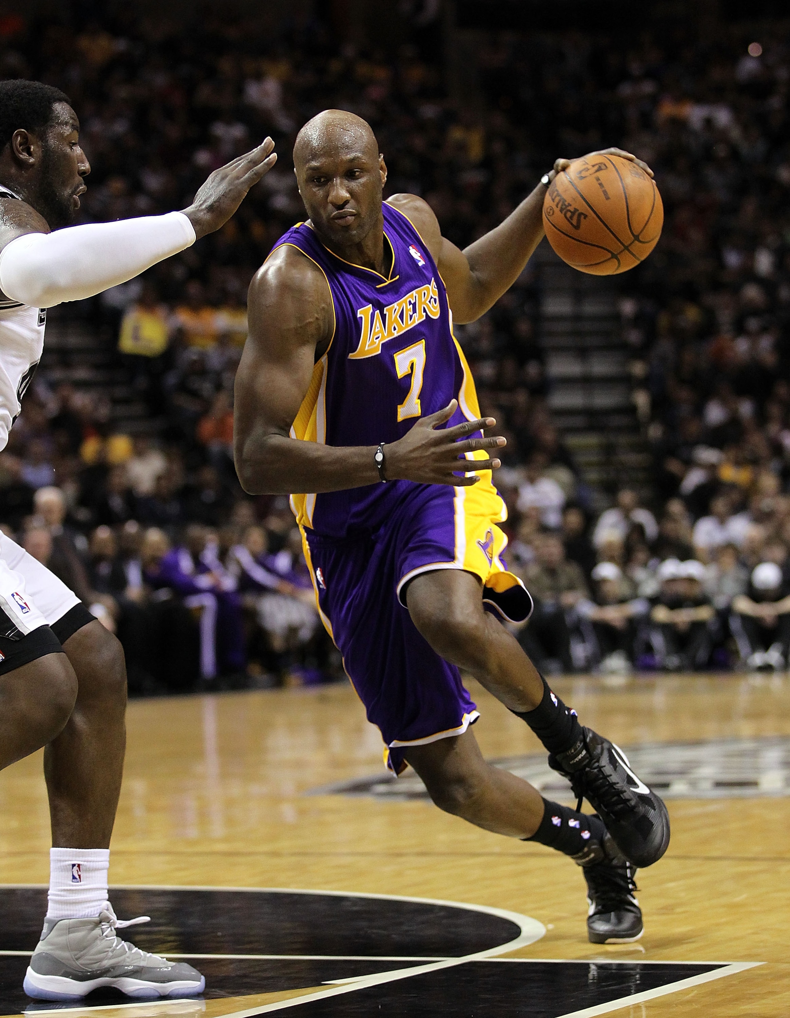 SAN ANTONIO, TX - DECEMBER 28:  Forward Lamar Odom #7 of the Los Angeles Lakers at AT&T Center on December 28, 2010 in San Antonio, Texas.  NOTE TO USER: User expressly acknowledges and agrees that, by downloading and/or using this photograph, user is con