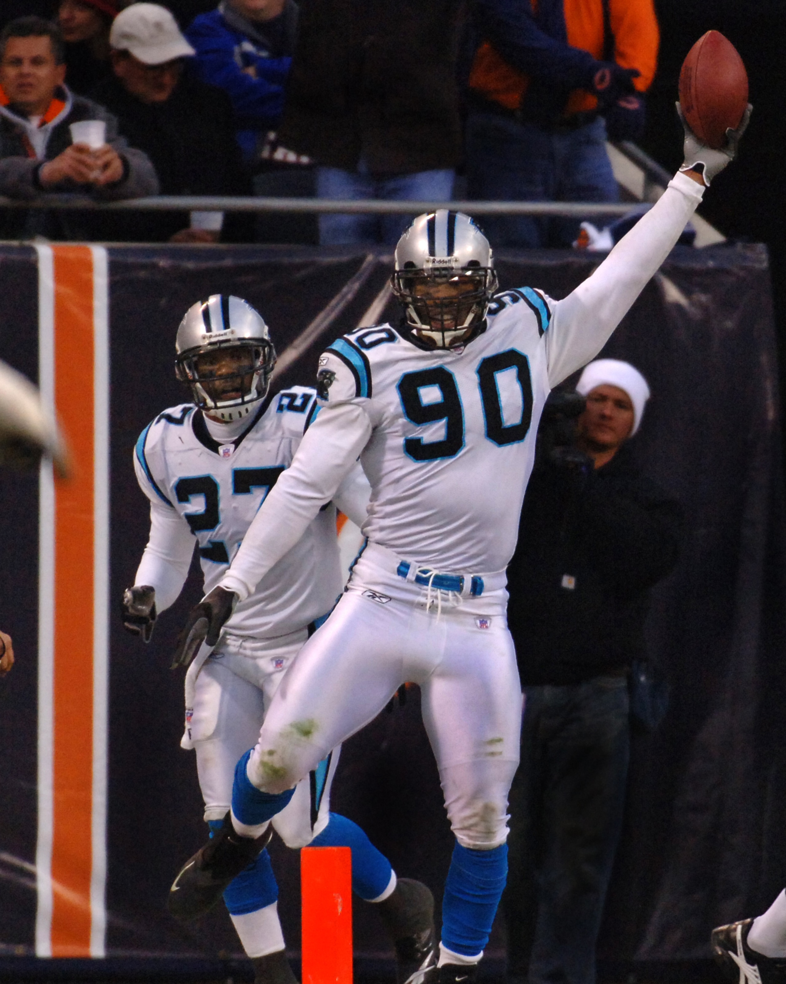 Carolina Panthers defensive end Julius Peppers celebrates a takeaway during an NFC divisional playoff game against the Chicago Bears January 15, 2006 at Soldier Field, Chicago. The play was called back and  the Panthers defeated the Bears 29 - 21.  (Photo