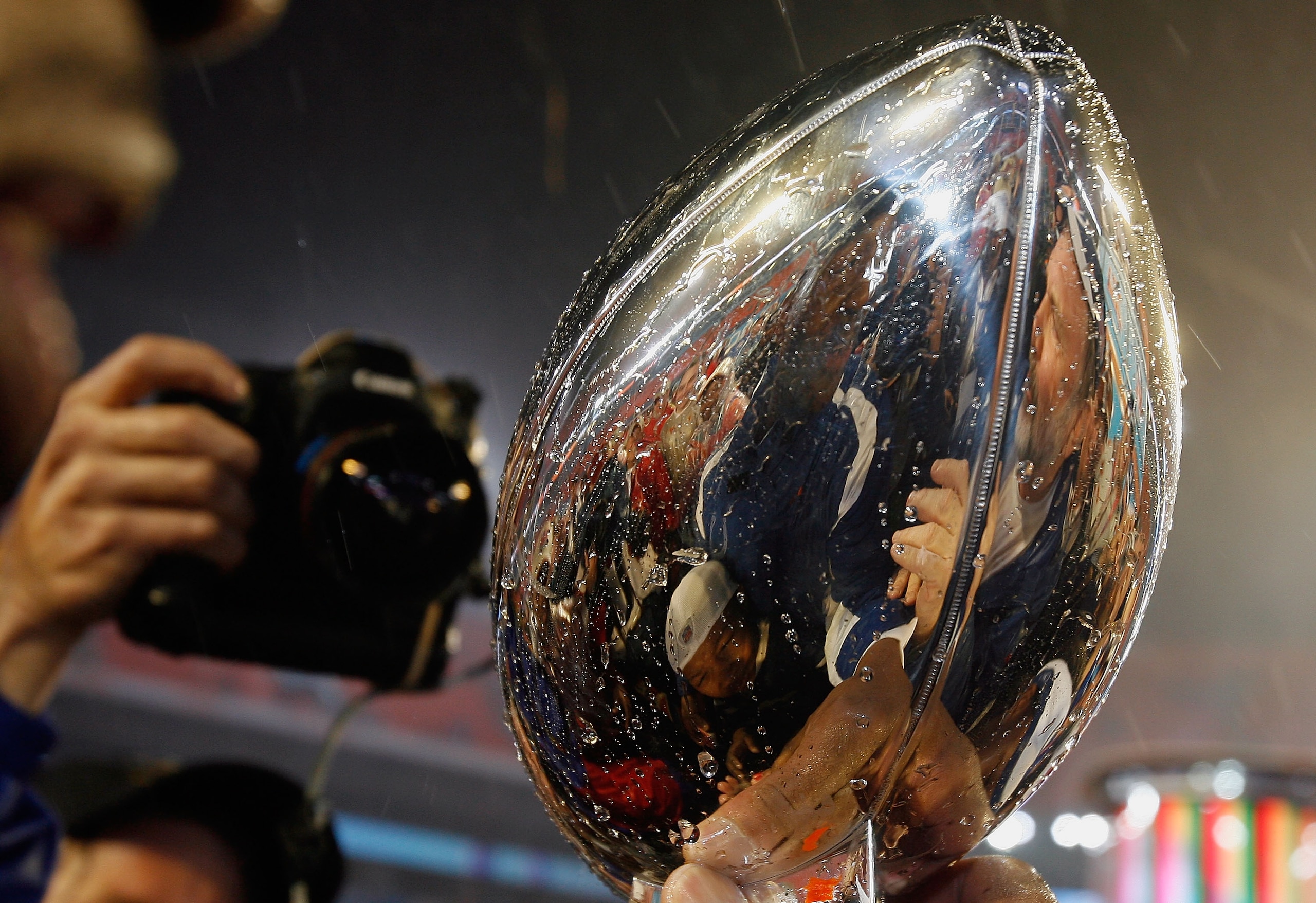 MIAMI GARDENS, FL - FEBRUARY 04:  The Vince Lombardi Super Bowl trophy is held up in celebration after the Colts won Super Bowl XLI 29-17 over the Chicago Bears on February 4, 2007 at Dolphin Stadium in Miami Gardens, Florida.  (Photo by Donald Miralle/Ge