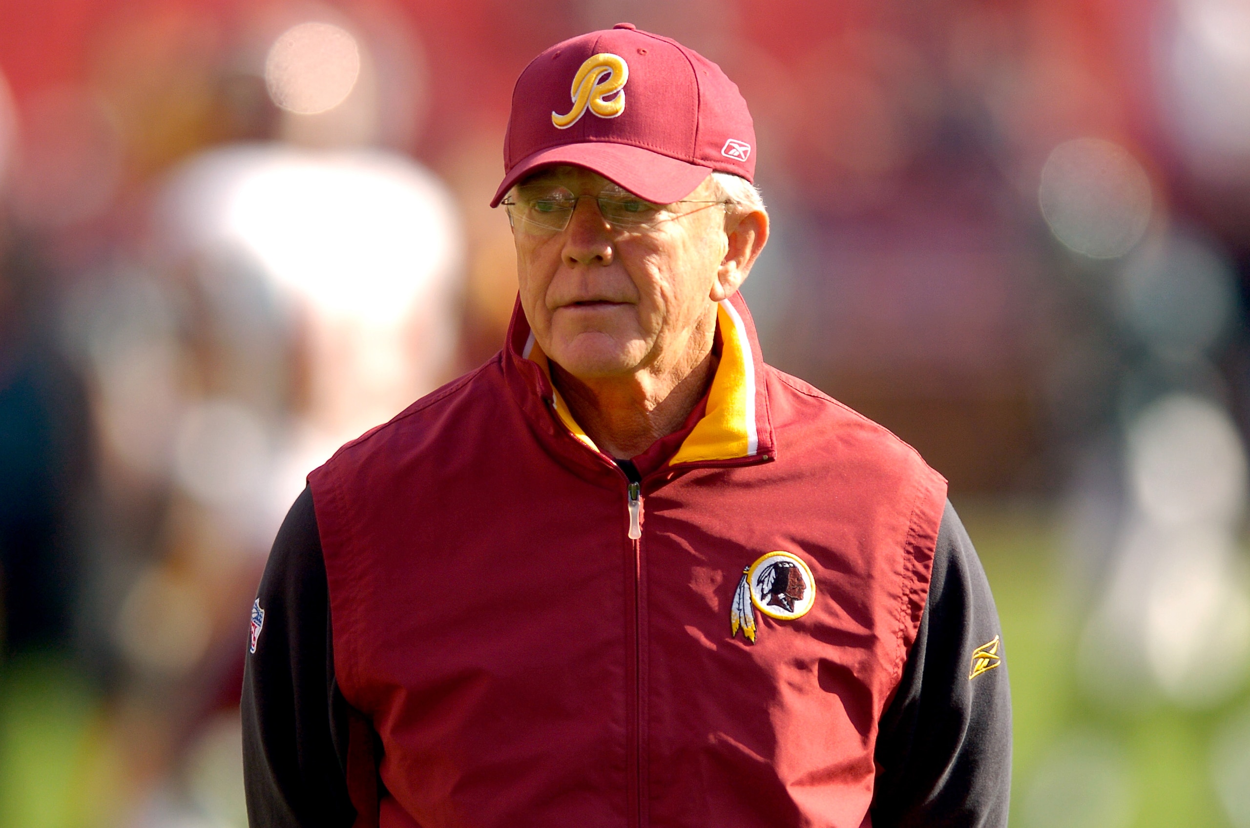LANDOVER, MD - NOVEMBER 11:  Head coach Joe Gibbs of the Washington Redskins watches warm ups before the game against the Philadelphia Eagles November 11, 2007 at FedEx Field in Landover, Maryland.  (Photo by Greg Fiume/Getty Images)