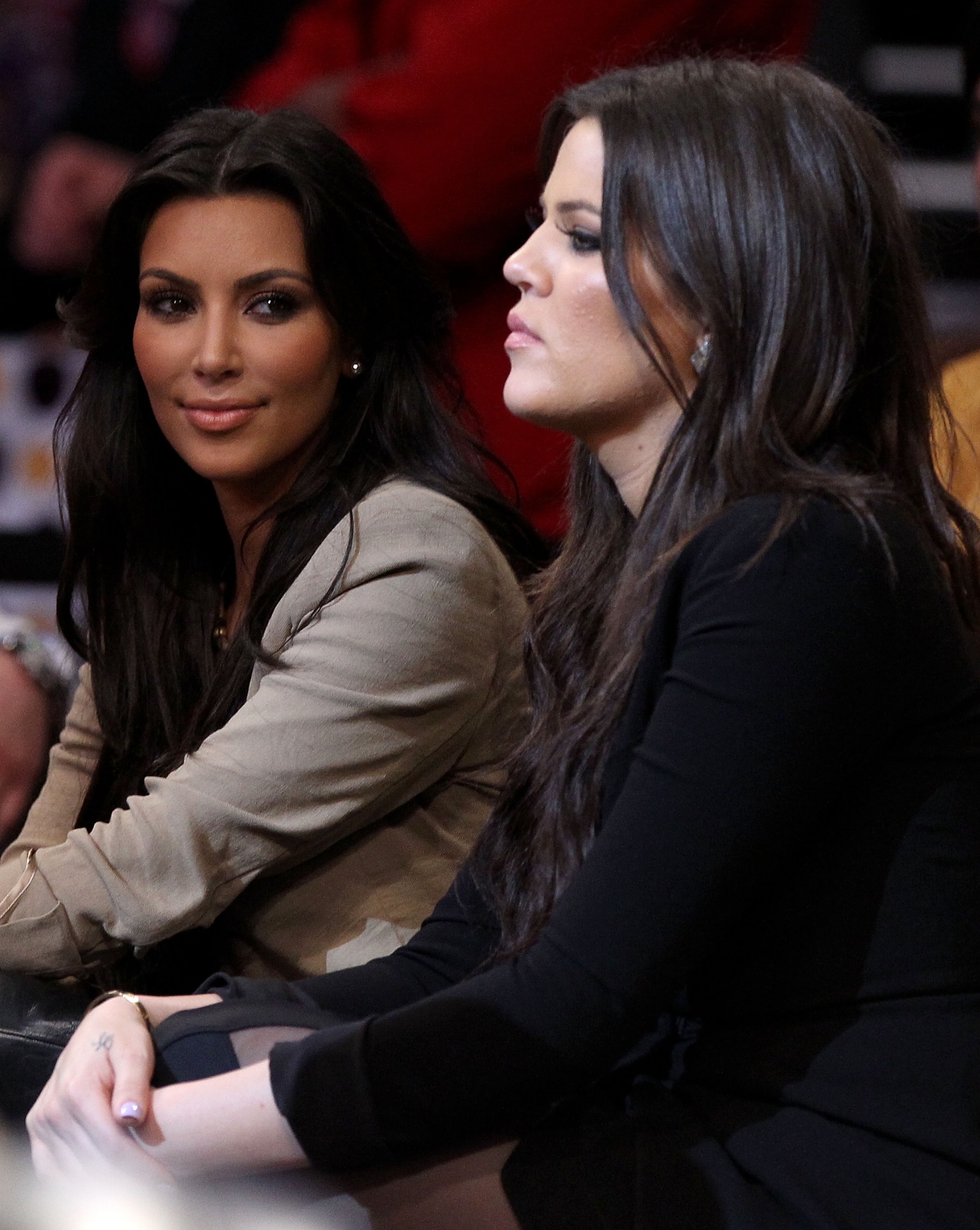 LOS ANGELES, CA - JUNE 17:  (L-R) Kim and Khloe Kardashian sit courtside at Game Seven of the 2010 NBA Finals at Staples Center between the Boston Celtics and the Los Angeles Lakers on June 17, 2010 in Los Angeles, California.  NOTE TO USER: User expressl