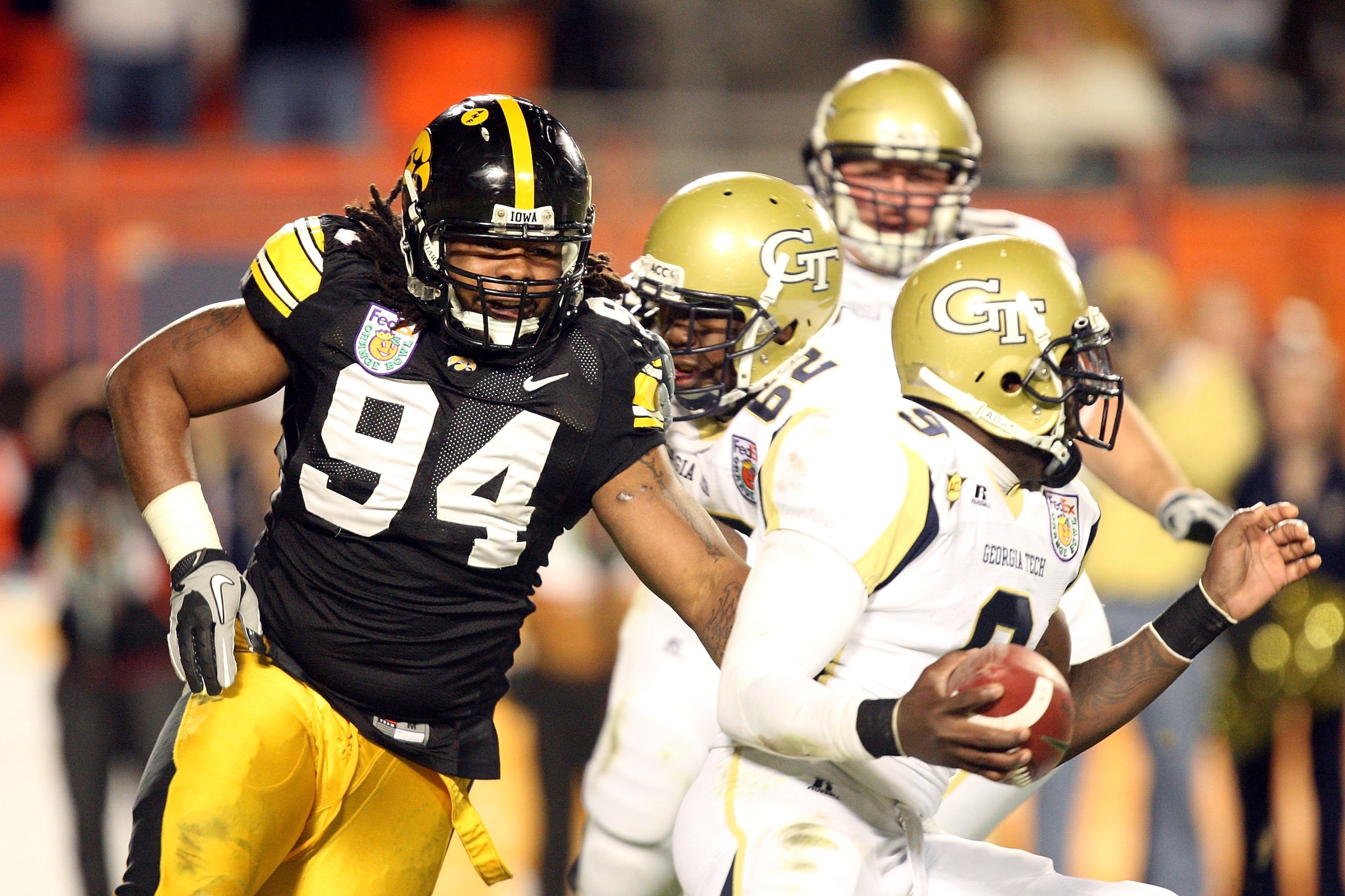 MIAMI GARDENS, FL - JANUARY 05: Adrian Clayborn #94 of the Iowa Hawkeyes rushes the quarterback against the Georgia Tech Yellow Jackets during the FedEx Orange Bowl at Land Shark Stadium on January 5, 2010 in Miami Gardens, Florida. (Photo by Streeter L MIAMI GARDENS, FL - JANUARY 05: Adrian Clayborn #94 of the Iowa Hawkeyes rushes the quarterback against the Georgia Tech Yellow Jackets during the FedEx Orange Bowl at Land Shark Stadium on January 5, 2010 in Miami Gardens, Florida. (Photo by Streeter L