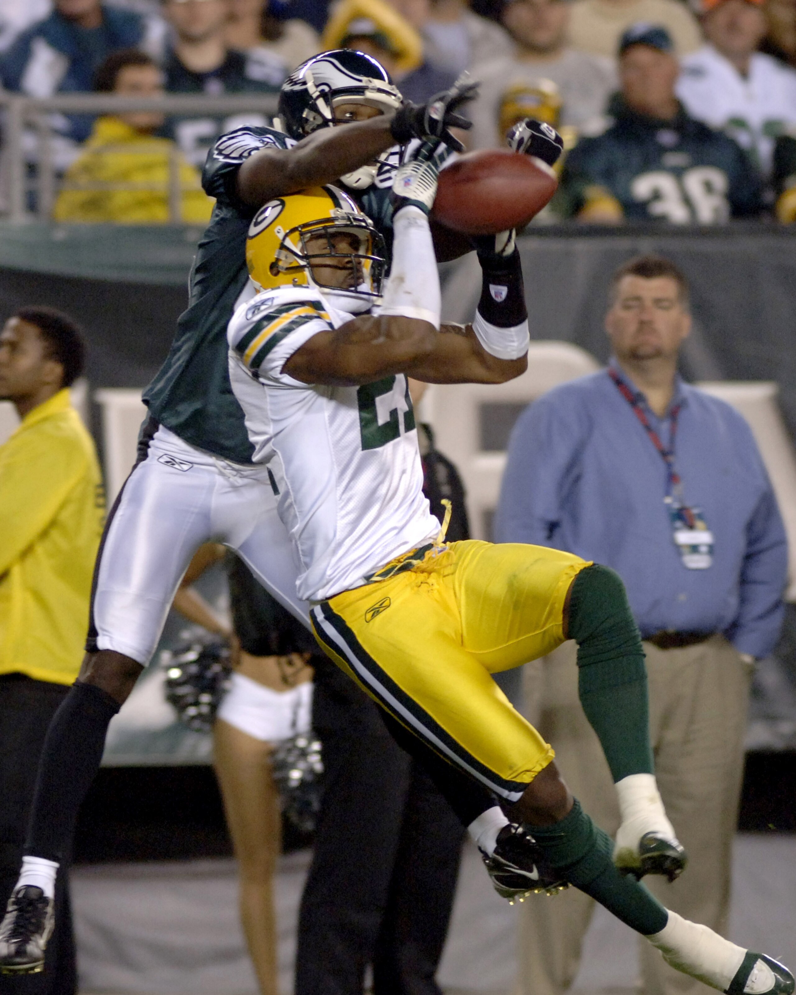 Reggie Brown of the Eagles goes up for the ball with the Packers' Charles Woodson during the game between the Green Bay Packers and the Philadelphia Eagles at Lincoln Financial Field in Philadelphia, Pa. on Monday, October 2nd, 2006.  (Photo by Al Messers