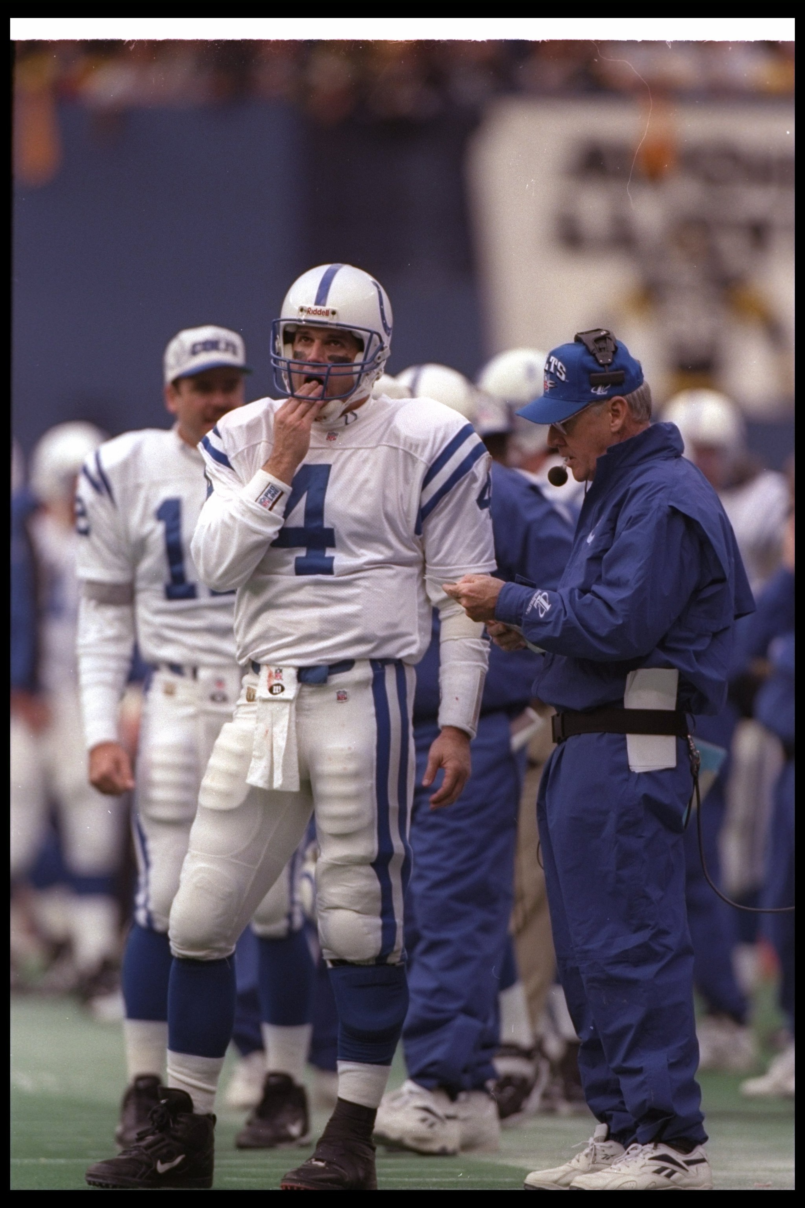 29 Dec 1996:  Quarterback Jim Harbaugh of the Indianapolis Colts looks on during a playoff game against the Pittsburgh Steelers at Three Rivers Stadium in Pittsburgh, Pennsylvania.  The Steelers won the game, 42-14. Mandatory Credit: Doug Pensinger  /Alls