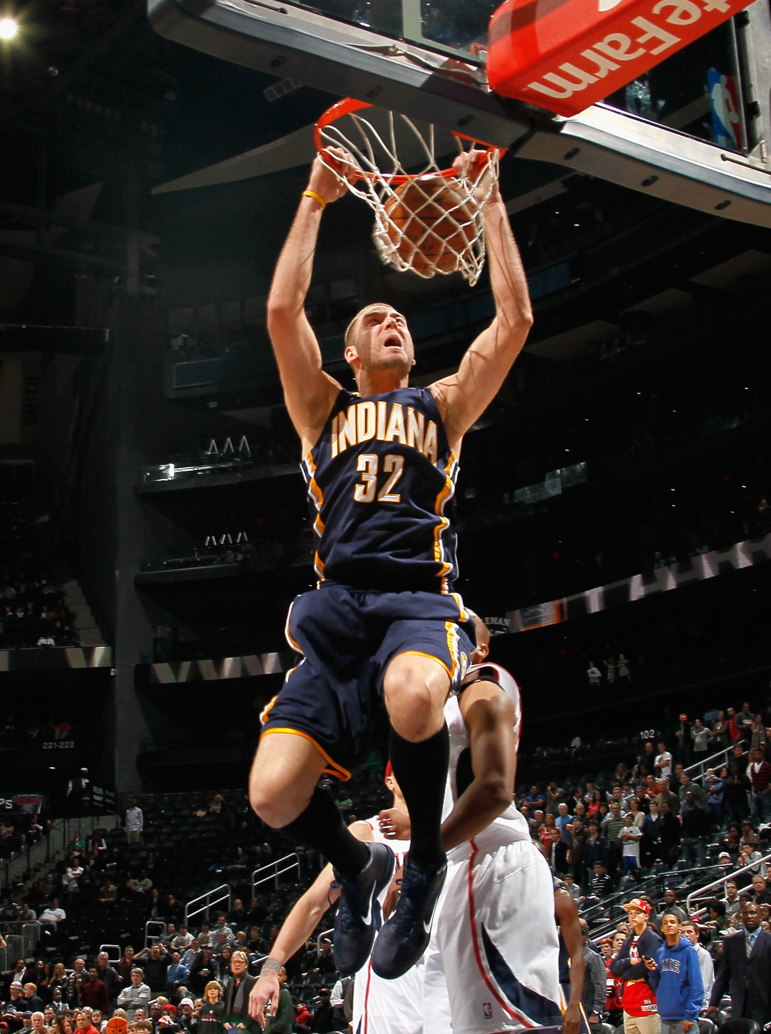 ATLANTA, GA - DECEMBER 11: Josh McRoberts #32 of the Indiana Pacers dunks against the Atlanta Hawks at Philips Arena on December 11, 2010 in Atlanta, Georgia. NOTE TO USER: User expressly acknowledges and agrees that, by downloading and/or using this Ph ATLANTA, GA - DECEMBER 11: Josh McRoberts #32 of the Indiana Pacers dunks against the Atlanta Hawks at Philips Arena on December 11, 2010 in Atlanta, Georgia. NOTE TO USER: User expressly acknowledges and agrees that, by downloading and/or using this Ph
