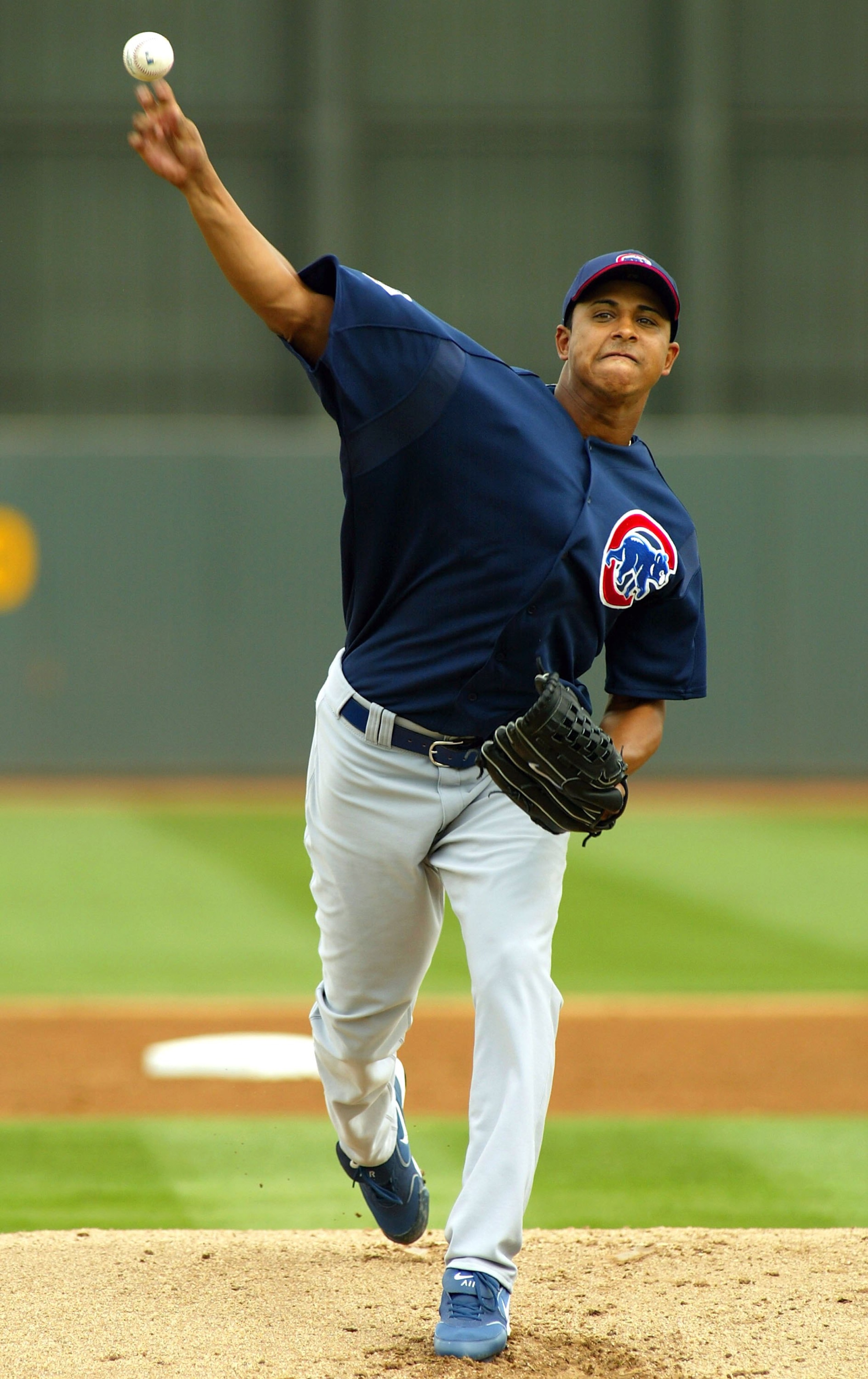 PHOENIX - MARCH 06:  Pitcher Angel Guzman #67 of the Chicago Cubs warms up in between innings of the Spring Training game against the Oakland Athletics on March 6, 2006 at the Phoenix Municipal Stadium in Phoenix, Arizona. The Cubs defeated the A's 12-3. 