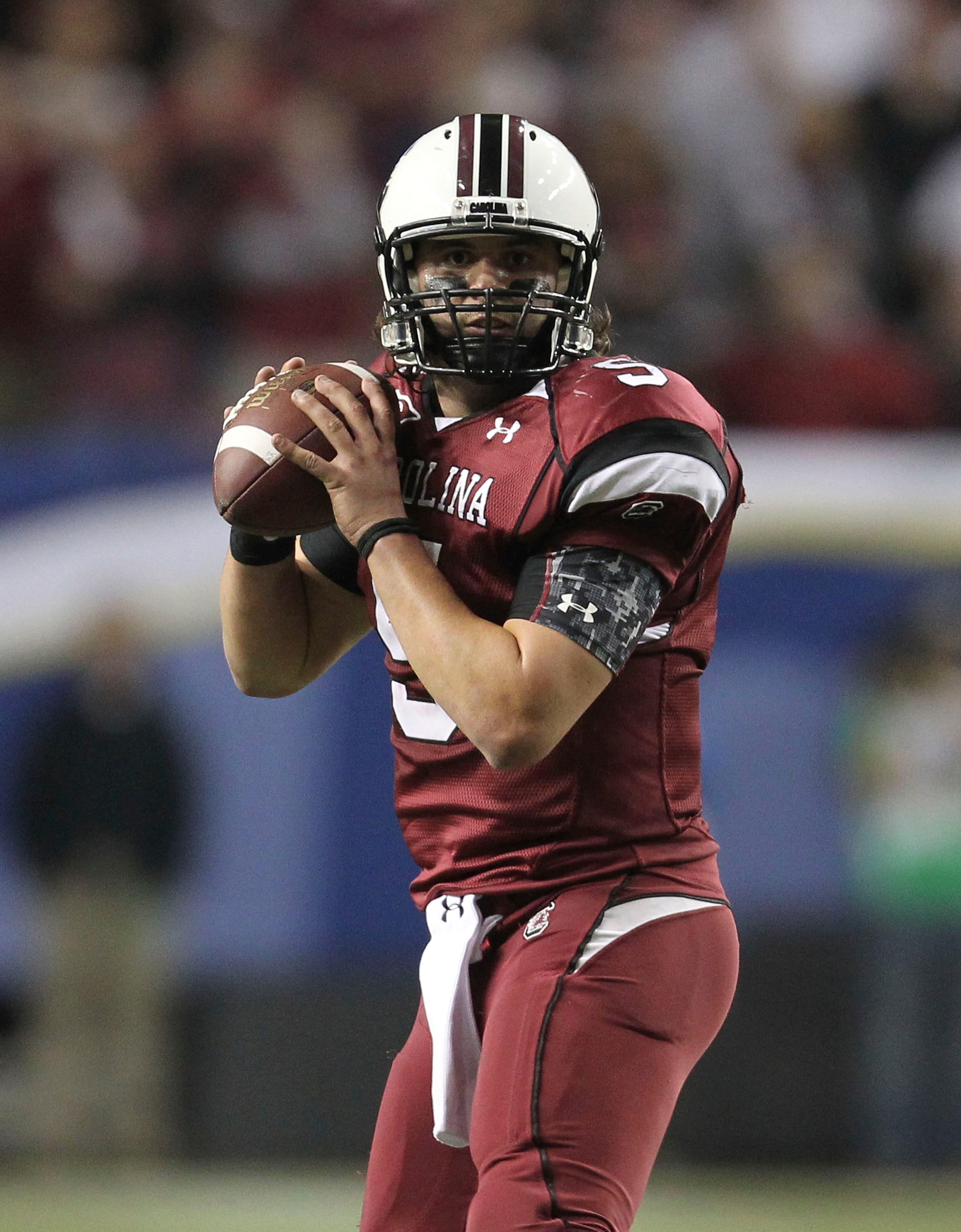 ATLANTA - DECEMBER 4:  Quarterback Stephen Garcia #5 of the South Carolina Gamecocks drops back to pass during the 2010 SEC Championship against the Auburn Tigers at Georgia Dome on December 4, 2010 in Atlanta, Georgia. (Photo by Mike Zarrilli/Getty Image