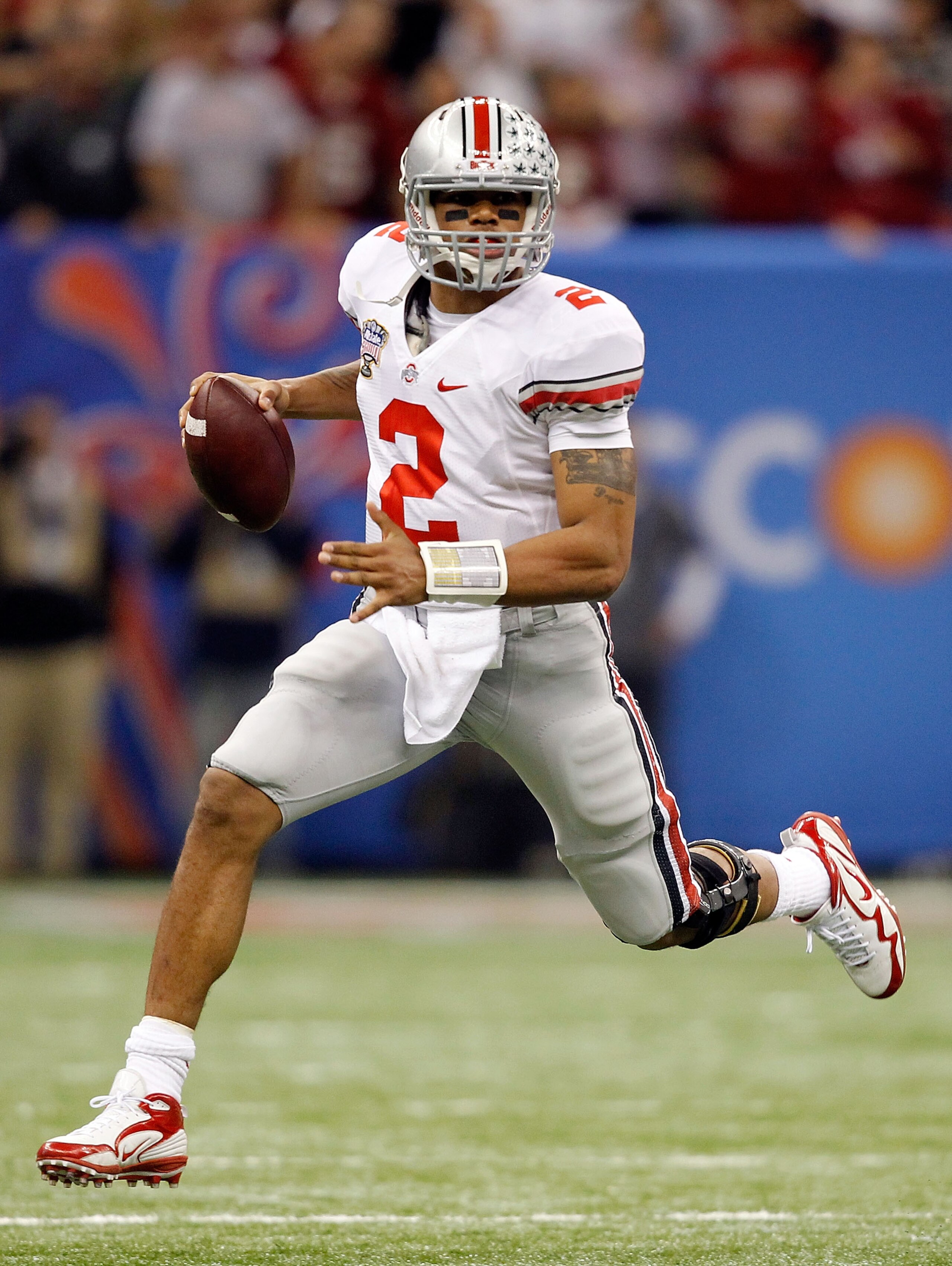 NEW ORLEANS, LA - JANUARY 04:  Terrelle Pryor #2 of the Ohio State Buckeyes looks to pass in the second half against the Arkansas Razorbacks during the Allstate Sugar Bowl at the Louisiana Superdome on January 4, 2011 in New Orleans, Louisiana.  (Photo by