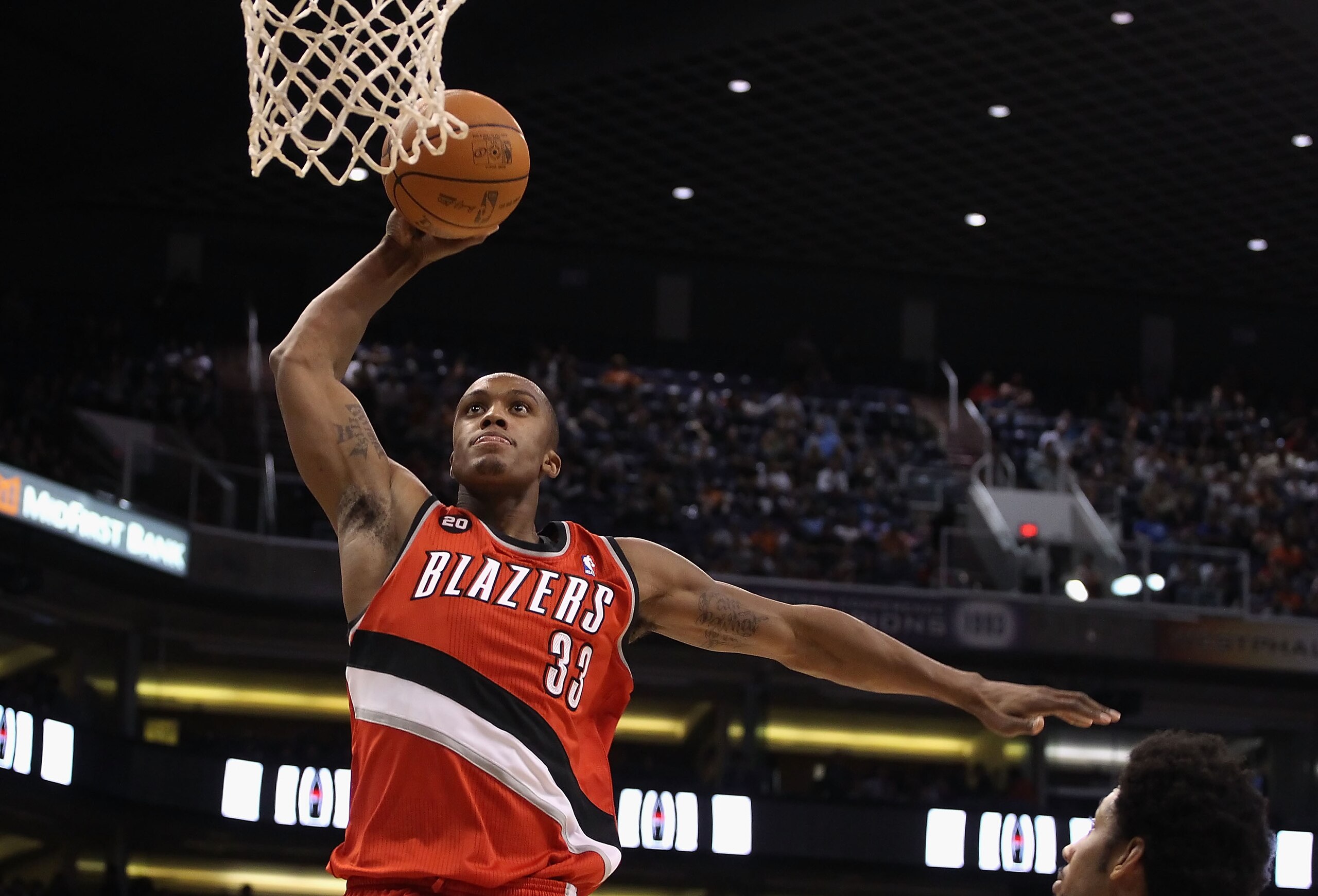 PHOENIX - DECEMBER 10: Dante Cunningham #33 of the Portland Trail Blazers slam dunks the ball against the Phoenix Suns during the NBA game at US Airways Center on December 10, 2010 in Phoenix, Arizona. The Trail Blazers defeated the Suns 101-94. NOTE TO PHOENIX - DECEMBER 10: Dante Cunningham #33 of the Portland Trail Blazers slam dunks the ball against the Phoenix Suns during the NBA game at US Airways Center on December 10, 2010 in Phoenix, Arizona. The Trail Blazers defeated the Suns 101-94. NOTE TO