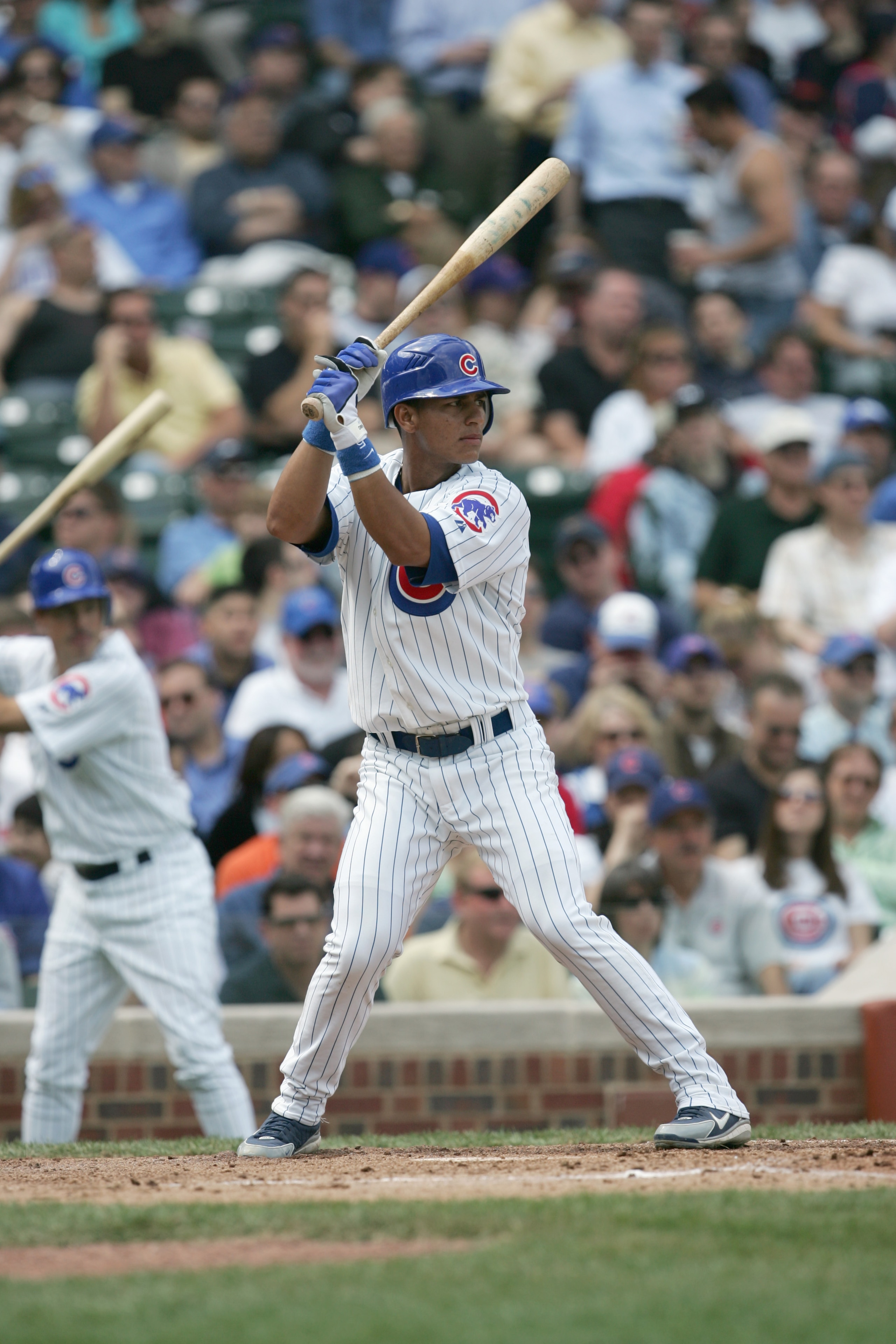CHICAGO - APRIL 12: Ronnie Cedeno #5 of the Chicago Cubs stands ready at bat during the game against the Cincinnati Reds on April 12, 2006 at Wrigley Field in Chicago, Illinois. The Cubs defeated the Reds 4-1. (Photo by Jonathan Daniel\Getty Images)