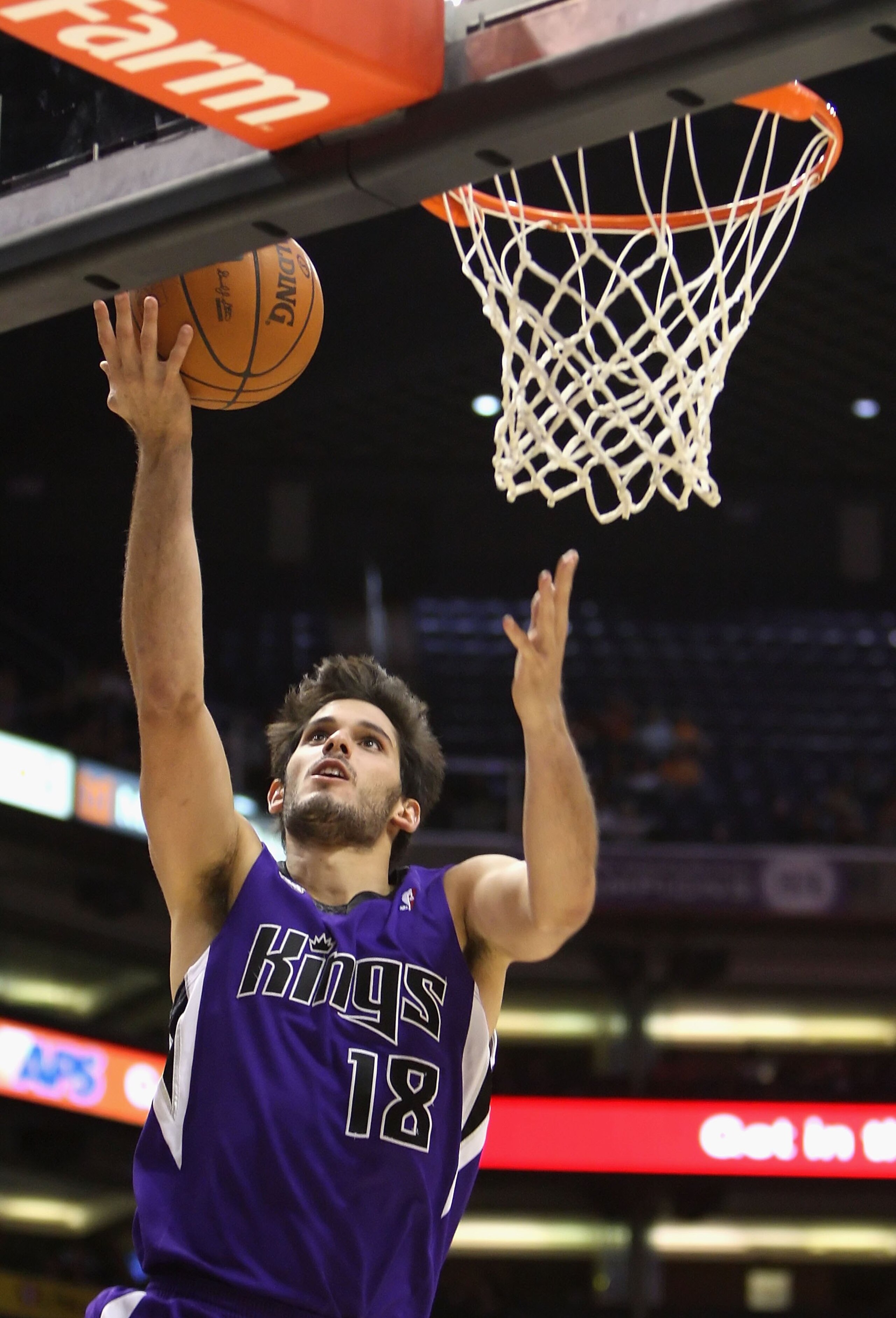 PHOENIX - OCTOBER 20:  Omri Casspi #18 of the Sacramento Kings lays up a shot against the Phoenix Suns during the NBA preseason game at US Airways Center on October 20, 2009 in Phoenix, Arizona. The Suns defeated the Kings 143-127.  NOTE TO USER: User exp