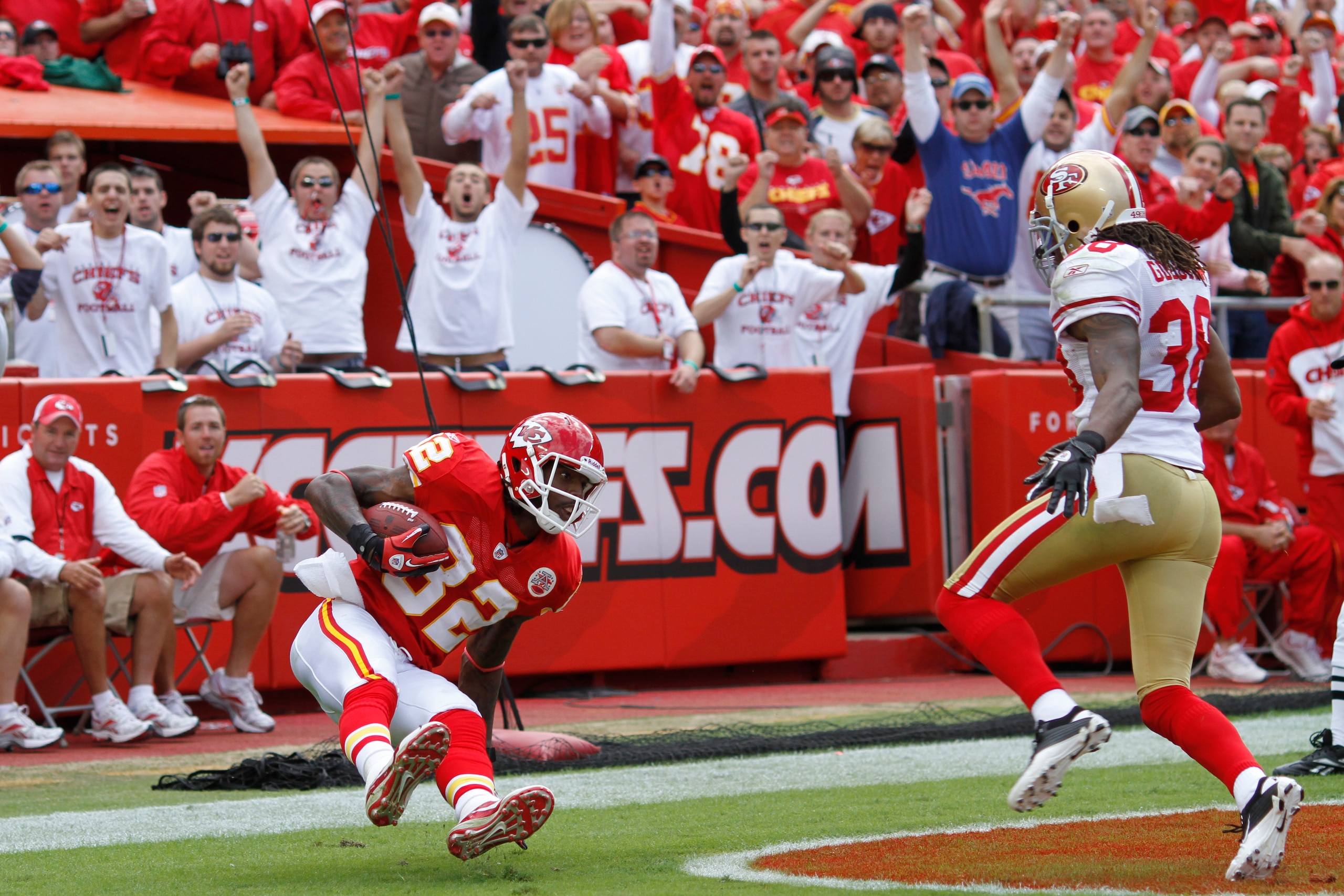 KANSAS CITY, MO - SEPTEMBER 26: Dwayne Bowe #82 of the Kansas City Chiefs makes a 45-yard touchdown reception behind Dashon Goldson #38 of the San Francisco 49ers at Arrowhead Stadium on September 26, 2010 in Kansas City, Missouri. The Chiefs won 31-10. ( KANSAS CITY, MO - SEPTEMBER 26: Dwayne Bowe #82 of the Kansas City Chiefs makes a 45-yard touchdown reception behind Dashon Goldson #38 of the San Francisco 49ers at Arrowhead Stadium on September 26, 2010 in Kansas City, Missouri. The Chiefs won 31-10. (