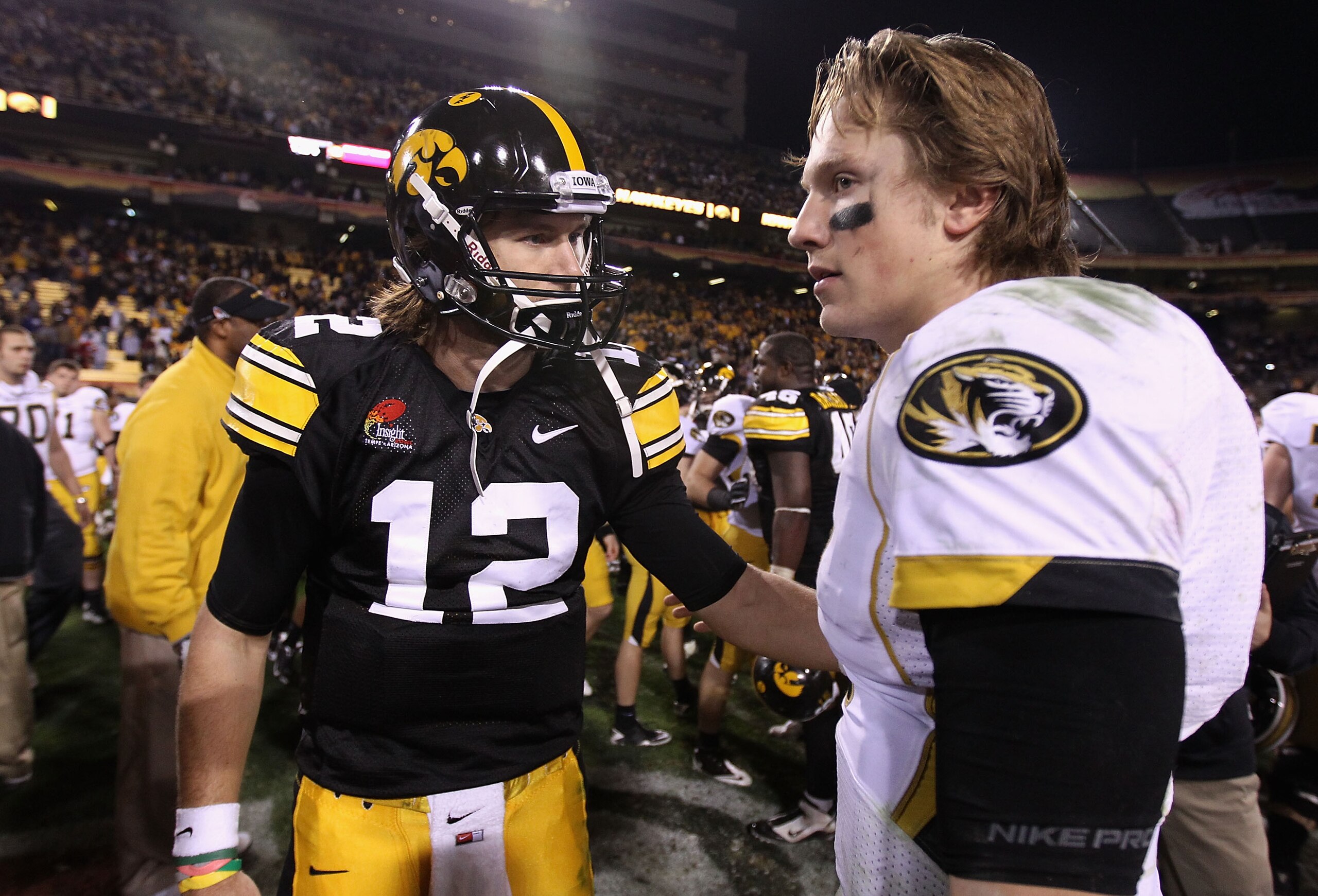 TEMPE, AZ - DECEMBER 28: Quarterback Ricky Stanzi #12 of the Iowa Hawkeyes greets Blaine Gabbert #11 of the Missouri Tigers following the Insight Bowl at Sun Devil Stadium on December 28, 2010 in Tempe, Arizona. The Hawkeyes defeated the Tigers 27-24. ( TEMPE, AZ - DECEMBER 28: Quarterback Ricky Stanzi #12 of the Iowa Hawkeyes greets Blaine Gabbert #11 of the Missouri Tigers following the Insight Bowl at Sun Devil Stadium on December 28, 2010 in Tempe, Arizona. The Hawkeyes defeated the Tigers 27-24. (