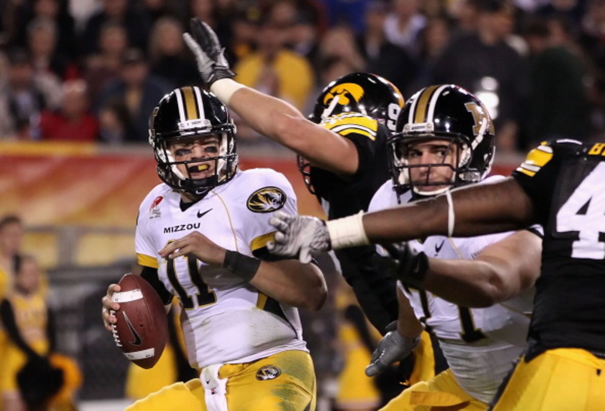TEMPE, AZ - DECEMBER 28: Quarterback Blaine Gabbert #11 of the Missouri Tigers is sacked by Karl Klug #95 of the Iowa Hawkeyes during the Insight Bowl at Sun Devil Stadium on December 28, 2010 in Tempe, Arizona. (Photo by Christian Petersen/Getty Images TEMPE, AZ - DECEMBER 28: Quarterback Blaine Gabbert #11 of the Missouri Tigers is sacked by Karl Klug #95 of the Iowa Hawkeyes during the Insight Bowl at Sun Devil Stadium on December 28, 2010 in Tempe, Arizona. (Photo by Christian Petersen/Getty Images
