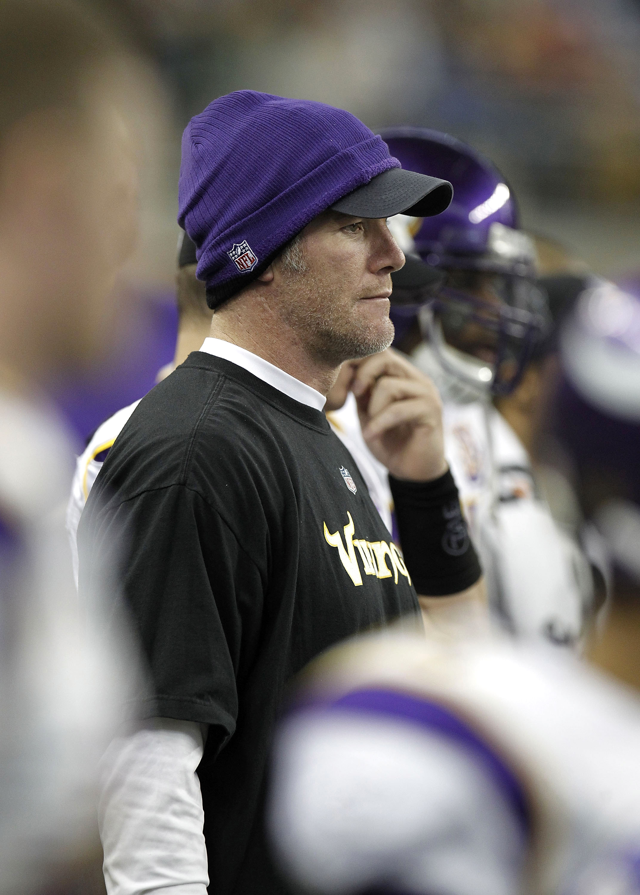 DETROIT, MI - JANUARY 02:  Brett Favre #4 of the Minnesota Vikings looks on from the bench while playing the Detroit Lions at Ford Field on January 2, 2011 in Detroit, Michigan.  (Photo by Gregory Shamus/Getty Images)