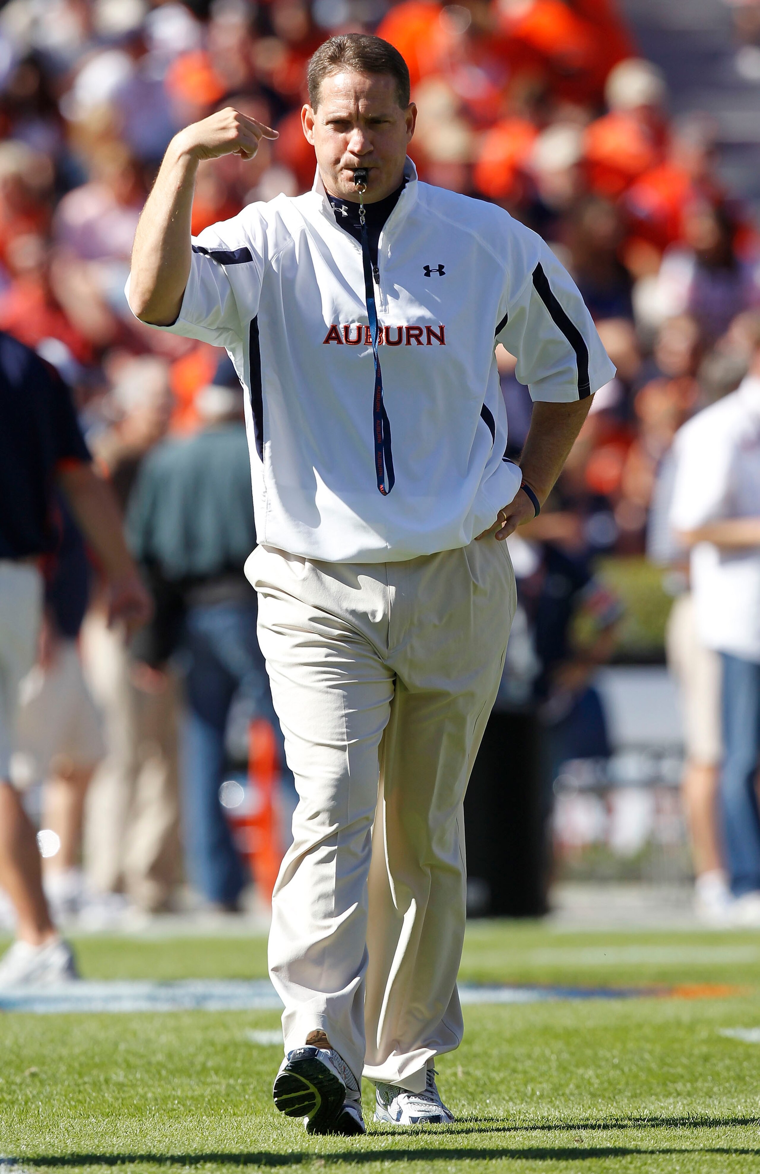 AUBURN - OCTOBER 16: Auburn head coach Gene Chizik blows his whistle during warm ups before the game against the Arkansas Razorbacks at Jordan-Hare Stadium on October 16, 2010 in Auburn, Alabama. (Photo by Mike Zarrilli/Getty Images) AUBURN - OCTOBER 16: Auburn head coach Gene Chizik blows his whistle during warm ups before the game against the Arkansas Razorbacks at Jordan-Hare Stadium on October 16, 2010 in Auburn, Alabama. (Photo by Mike Zarrilli/Getty Images)