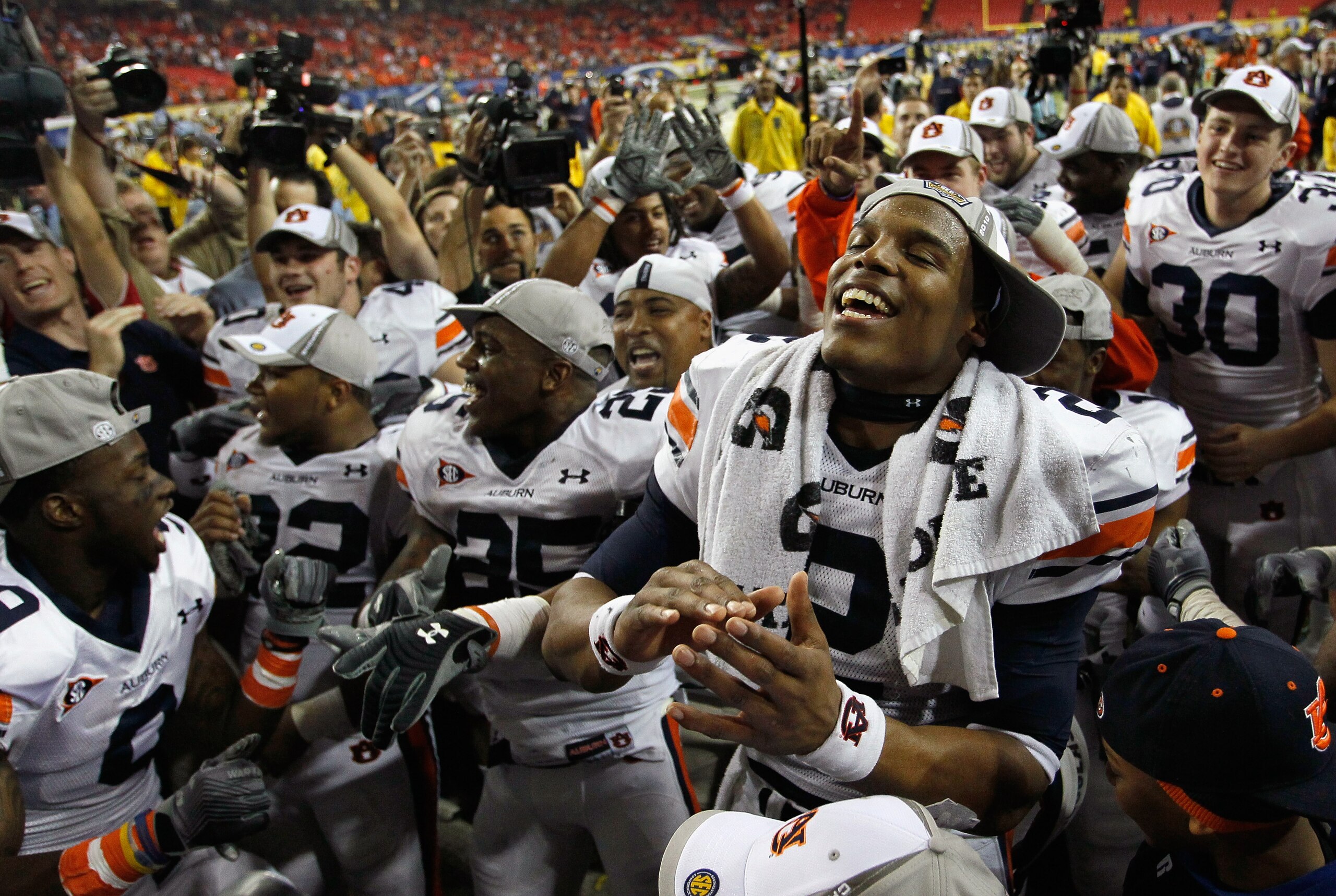 ATLANTA, GA - DECEMBER 04:  Quarterback Cam Newton #2 of the Auburn Tigers celebrates after their 56-17 win over the South Carolina Gamecocks during the 2010 SEC Championship at Georgia Dome on December 4, 2010 in Atlanta, Georgia.  (Photo by Kevin C. Cox