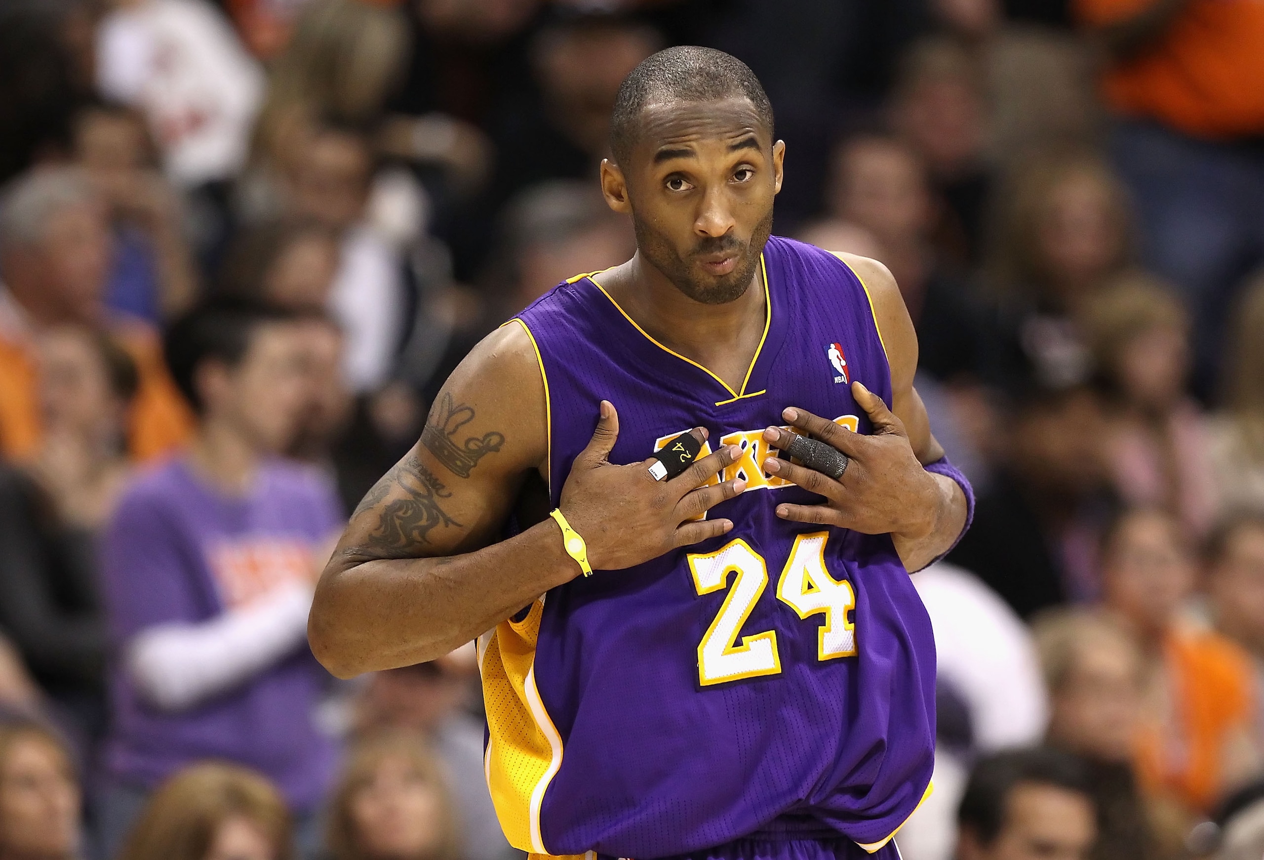 PHOENIX - JANUARY 05:  Kobe Bryant #24 of the Los Angeles Lakers reacts during the NBA game against the Phoenix Suns at US Airways Center on December 23, 2011 in Phoenix, Arizona. The Lakers defeated the Suns 99-95.  NOTE TO USER: User expressly acknowled