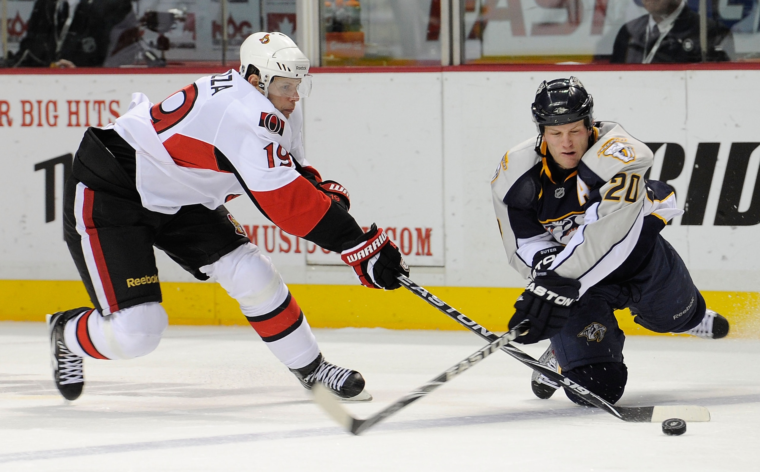 NASHVILLE, TN - DECEMBER 23:  Ryan Suter #20 of the Nashville Predators ties up Jason Spezza #19 of the Ottawa Senators on December 23, 2010 at the Bridgestone Arena in Nashville, Tennessee.  (Photo by Frederick Breedon/Getty Images)