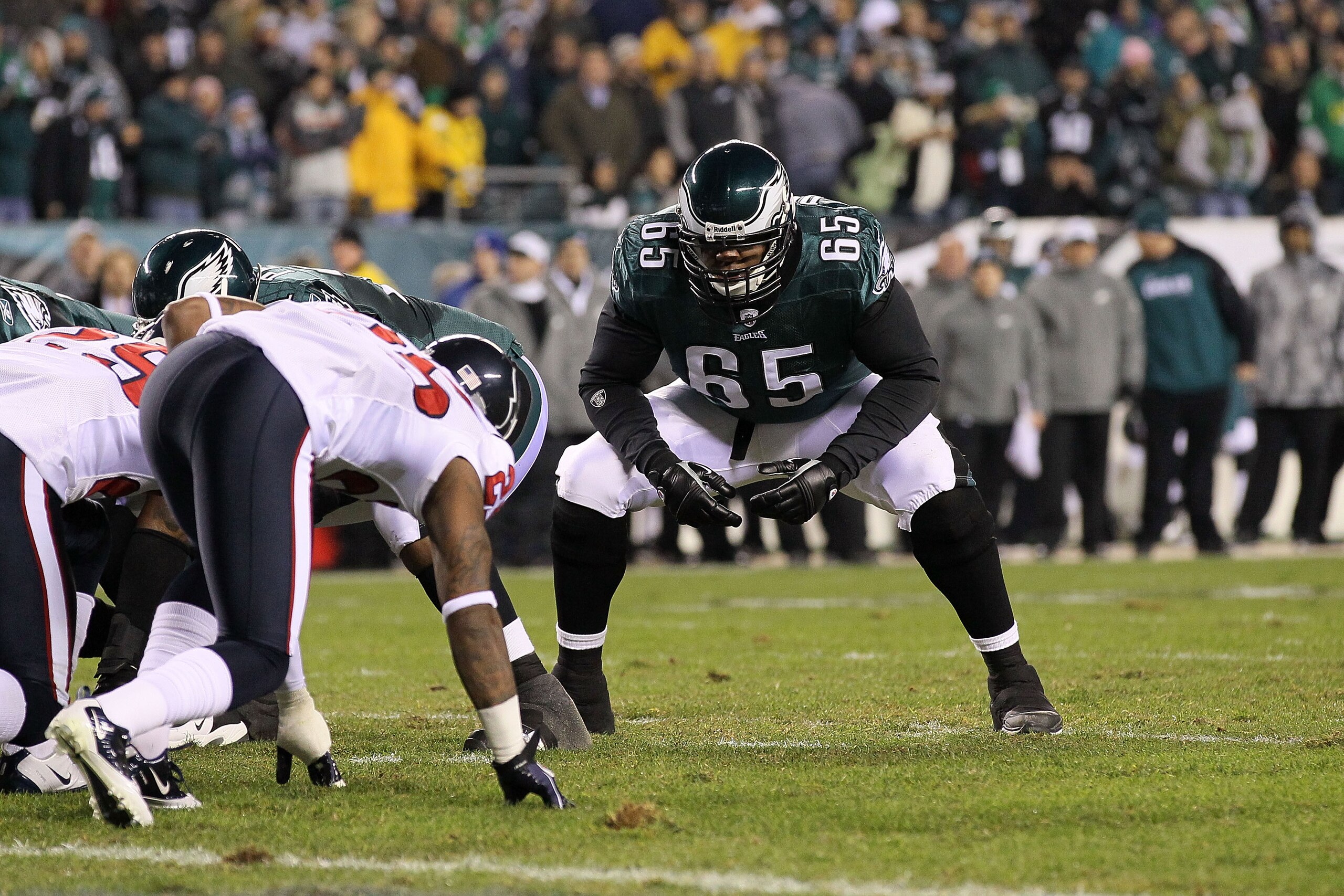 PHILADELPHIA, PA - DECEMBER 02:  Offensive tackle King Dunlap #65 of the Philadelphia Eagles gets set in his stance on a special teams play against the Houston Texans at Lincoln Financial Field on December 2, 2010 in Philadelphia, Pennsylvania.  (Photo by