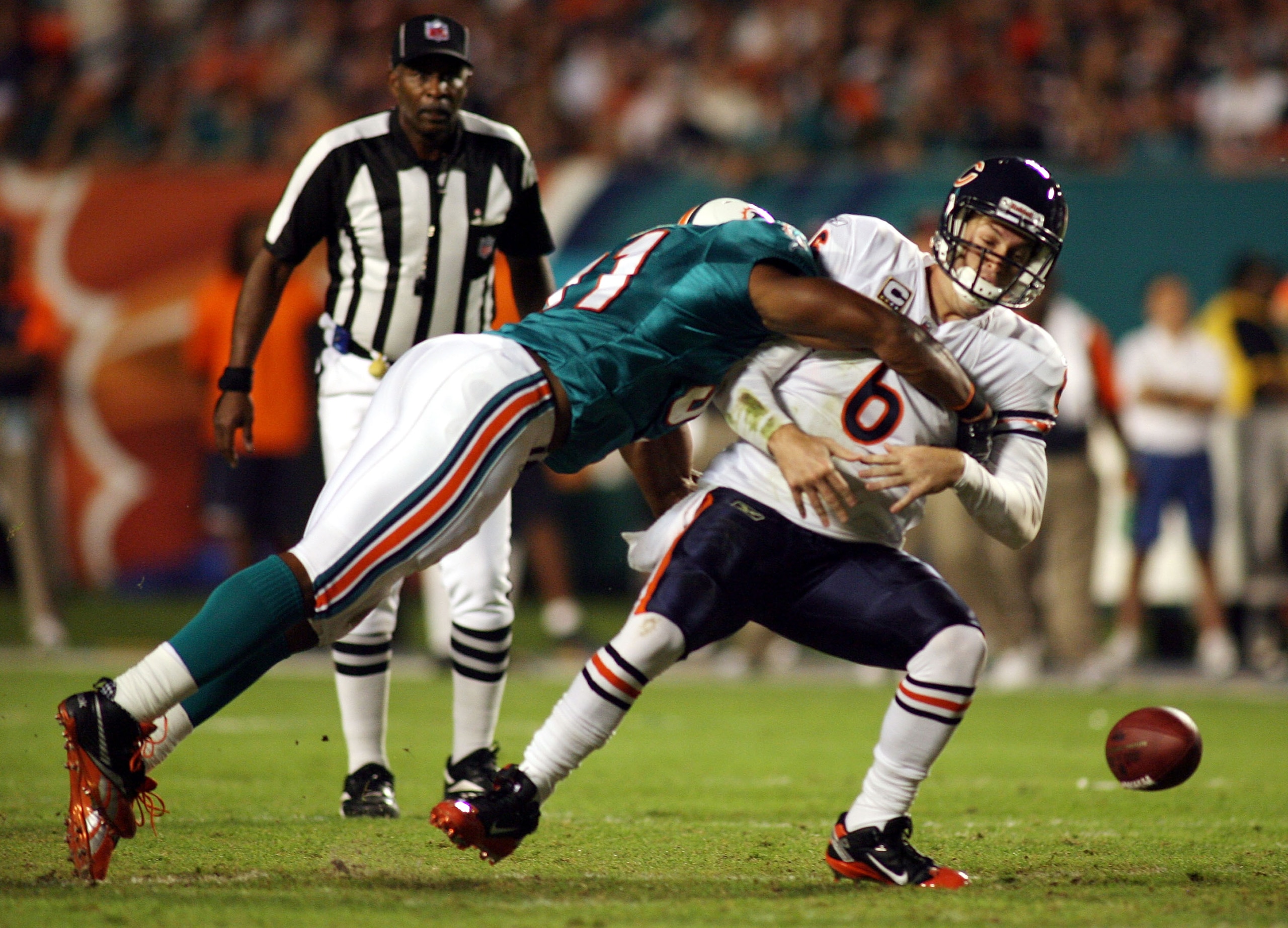 MIAMI - NOVEMBER 18: Quarterback Jay Cutler #6 of the Chicago Bears is sacked by linebacker Cameron wake #91 of the Miami Dolphins and fumbles at Sun Life Stadium on November 18, 2010 in Miami, Florida. (Photo by Marc Serota/Getty Images) MIAMI - NOVEMBER 18: Quarterback Jay Cutler #6 of the Chicago Bears is sacked by linebacker Cameron wake #91 of the Miami Dolphins and fumbles at Sun Life Stadium on November 18, 2010 in Miami, Florida. (Photo by Marc Serota/Getty Images)