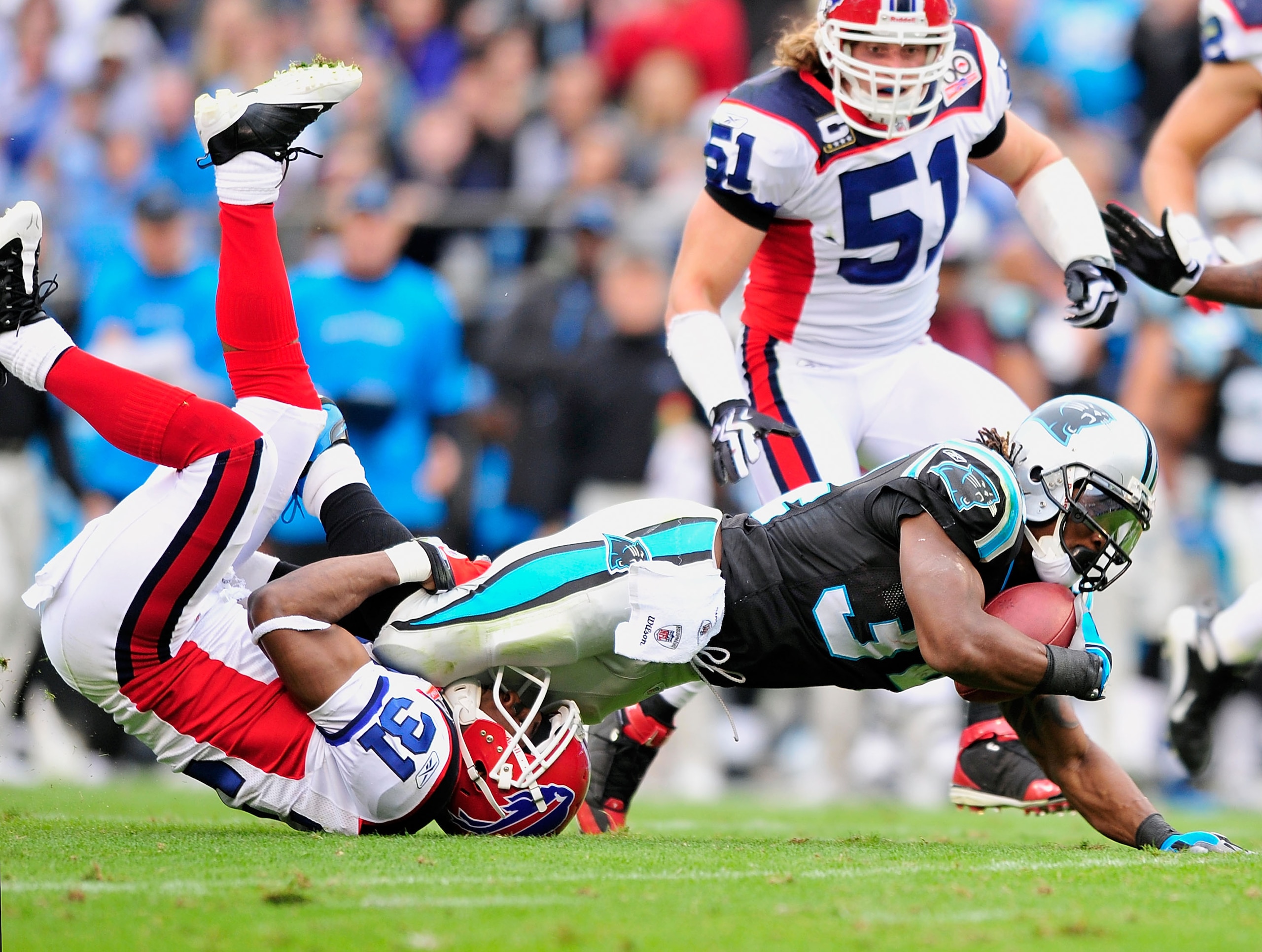 CHARLOTTE, NC - OCTOBER 25: Jarius Byrd #31 of the Buffalo Bills tackles DeAngelo Williams #34 of the Carolina Panthers during the first quarter at Bank of America Stadium on October 25, 2009 in Charlotte, North Carolina. (Photo by Grant Halverson/Gett CHARLOTTE, NC - OCTOBER 25: Jarius Byrd #31 of the Buffalo Bills tackles DeAngelo Williams #34 of the Carolina Panthers during the first quarter at Bank of America Stadium on October 25, 2009 in Charlotte, North Carolina. (Photo by Grant Halverson/Gett