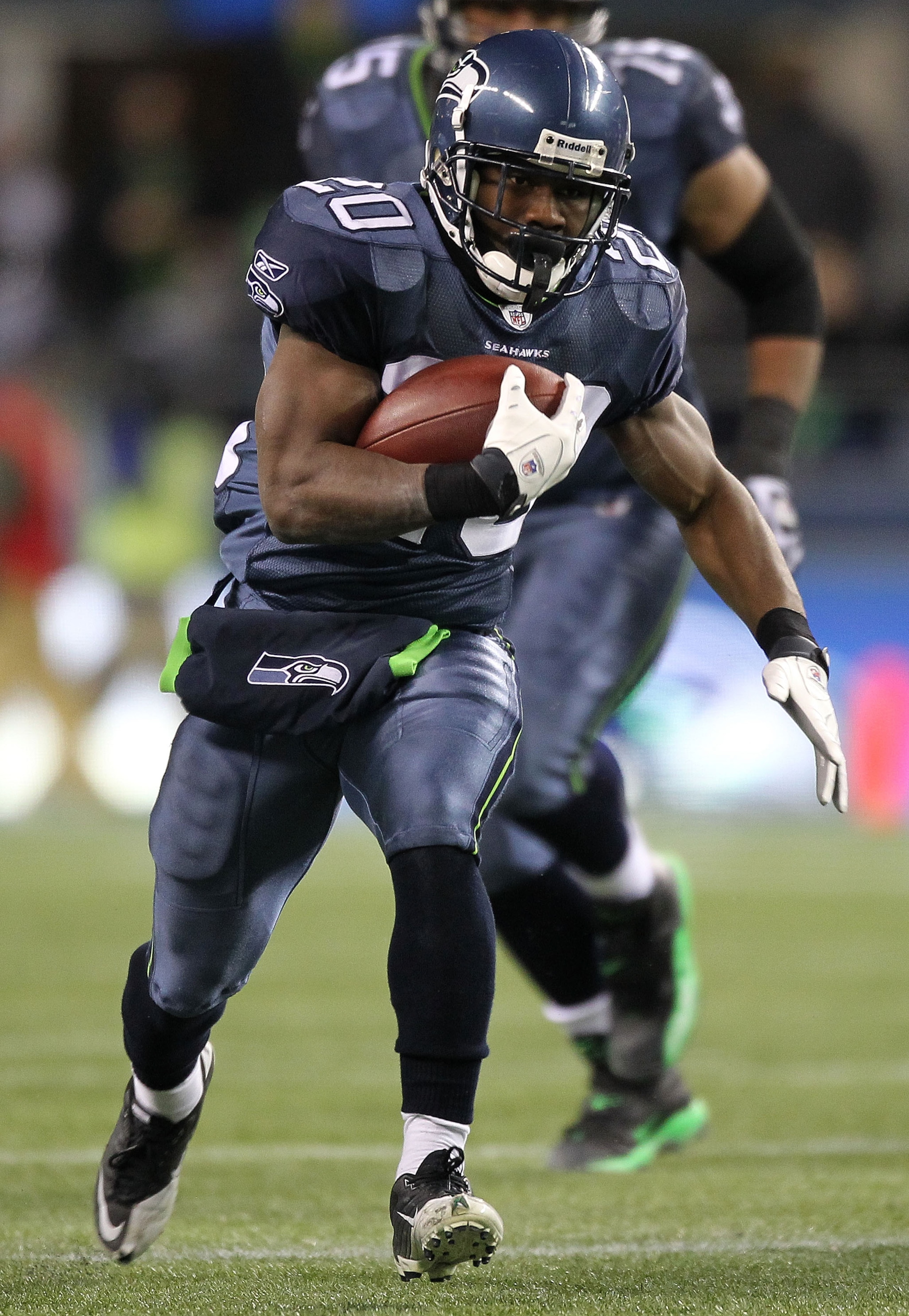 SEATTLE, WA - JANUARY 02:  Running back Justin Forsett #20 of the Seattle Seahawks rushes with the ball against the St. Louis Rams during their game at Qwest Field on January 2, 2011 in Seattle, Washington.  (Photo by Otto Greule Jr/Getty Images)