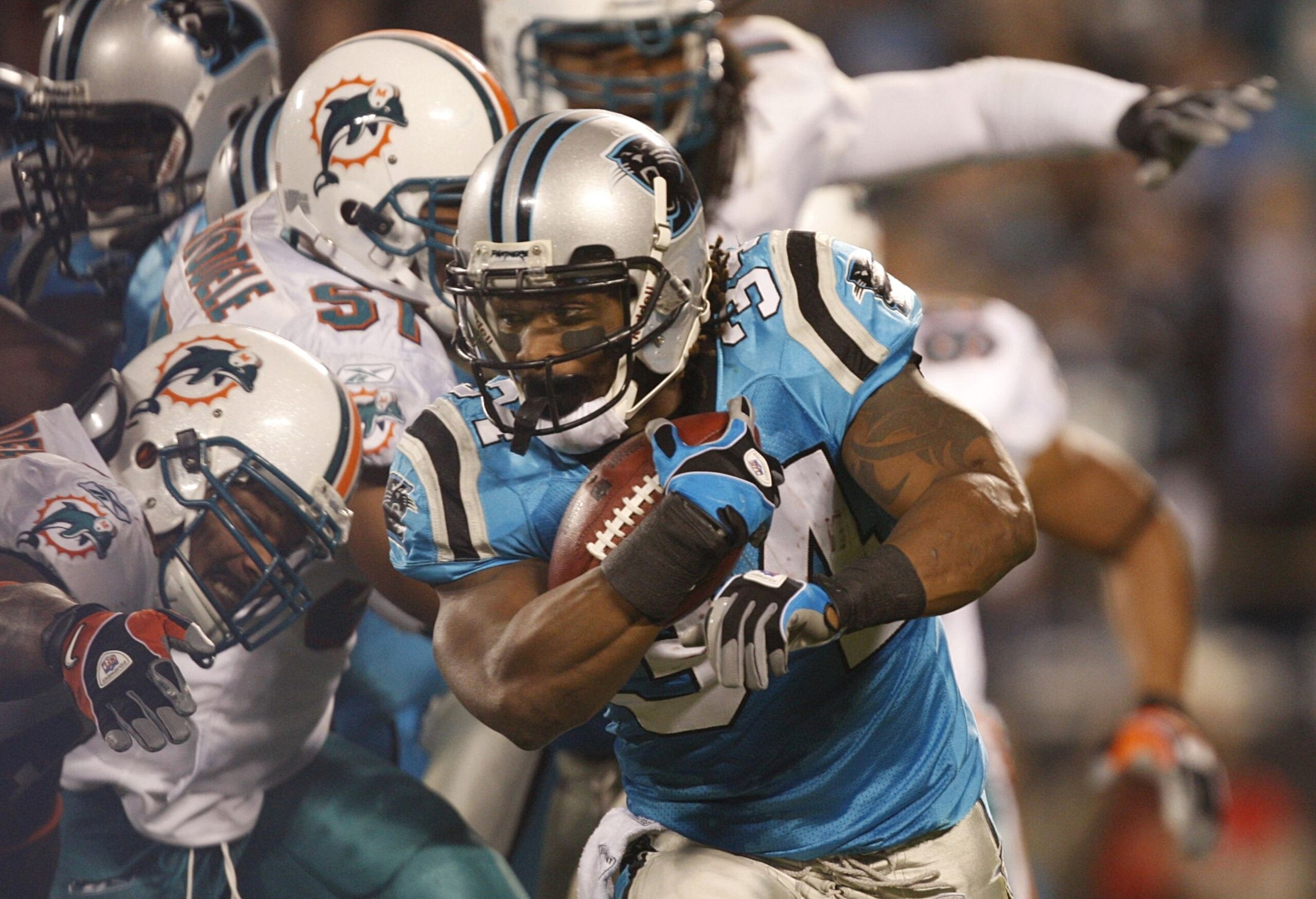 CHARLOTTE - NOVEMBER 19: DeAngelo Williams #34 of the Carolina Panthers runs with the ball against the Miami Dolphins at Bank of America Stadium on November 19, 2009 in Charlotte, North Carolina. (Photo by Streeter Lecka/Getty Images) CHARLOTTE - NOVEMBER 19: DeAngelo Williams #34 of the Carolina Panthers runs with the ball against the Miami Dolphins at Bank of America Stadium on November 19, 2009 in Charlotte, North Carolina. (Photo by Streeter Lecka/Getty Images)
