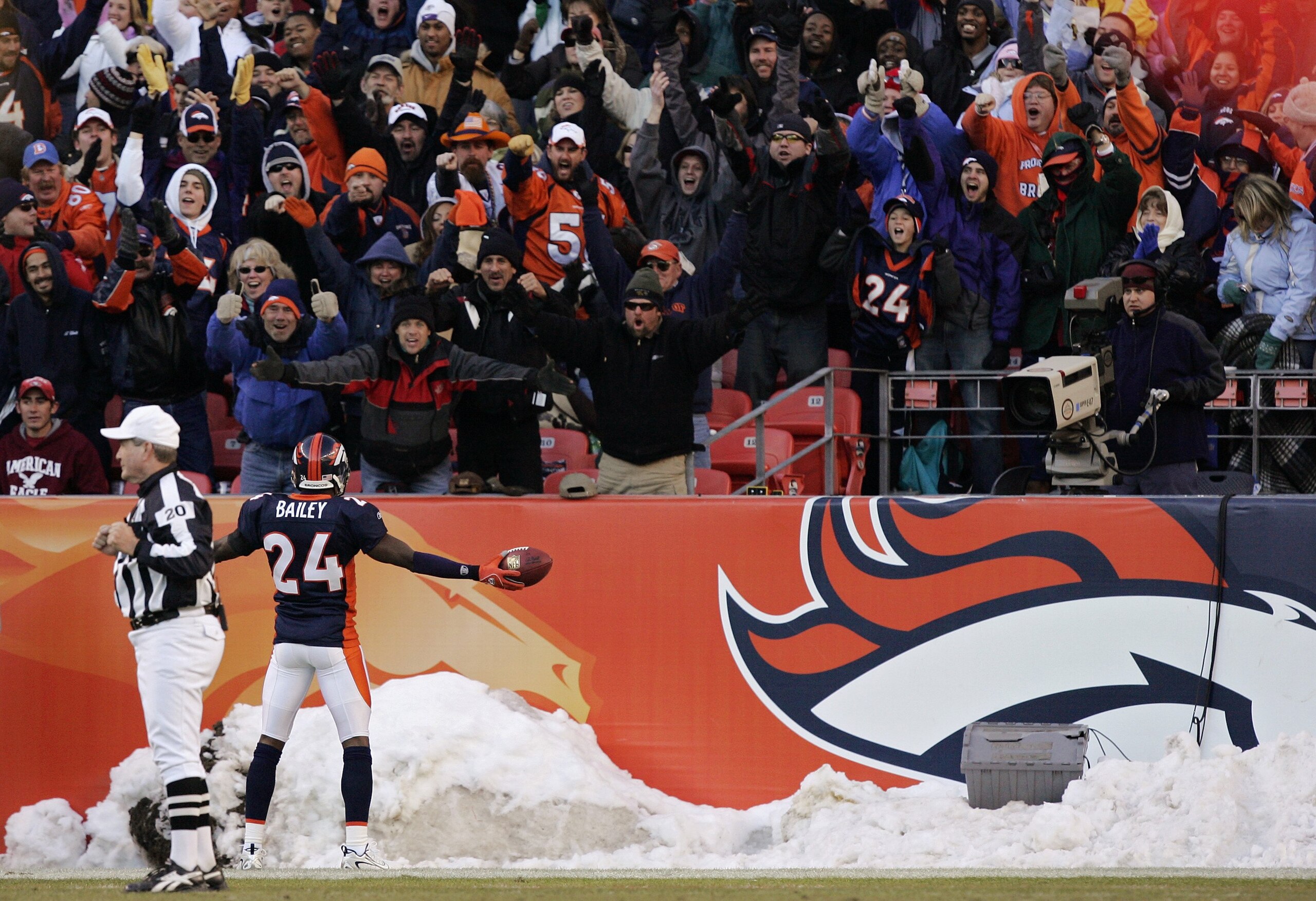DENVER - DECEMBER 31: Champ Bailey #24 of the Denver Broncos celebrates an interception for a 70-yard touchdown against the San Francisco 49s in the second quarter at Invesco Field at Mile High December 31, 2006 in Denver, Colorado. (Photo by Brian Bahr DENVER - DECEMBER 31: Champ Bailey #24 of the Denver Broncos celebrates an interception for a 70-yard touchdown against the San Francisco 49s in the second quarter at Invesco Field at Mile High December 31, 2006 in Denver, Colorado. (Photo by Brian Bahr
