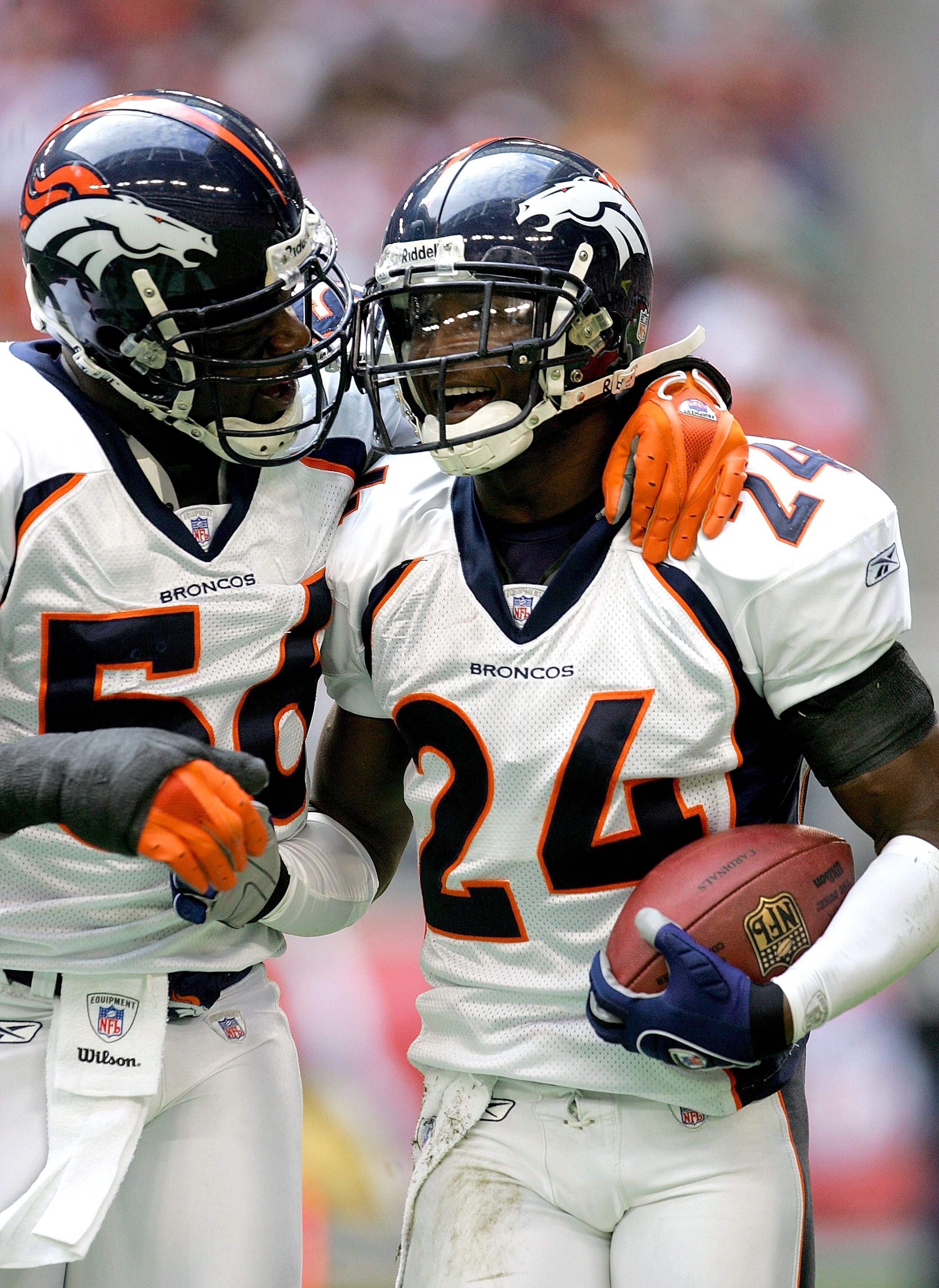 GLENDALE, AZ - DECEMBER 17: Cornerback Champ Bailey #24 and linebacker Al Wilson #56 of the Denver Broncos celebrate after Bailey's first quarter pass interception against the Arizona Cardinals on December 17, 2006 at University of Phoenix Stadium in Glen GLENDALE, AZ - DECEMBER 17: Cornerback Champ Bailey #24 and linebacker Al Wilson #56 of the Denver Broncos celebrate after Bailey's first quarter pass interception against the Arizona Cardinals on December 17, 2006 at University of Phoenix Stadium in Glen