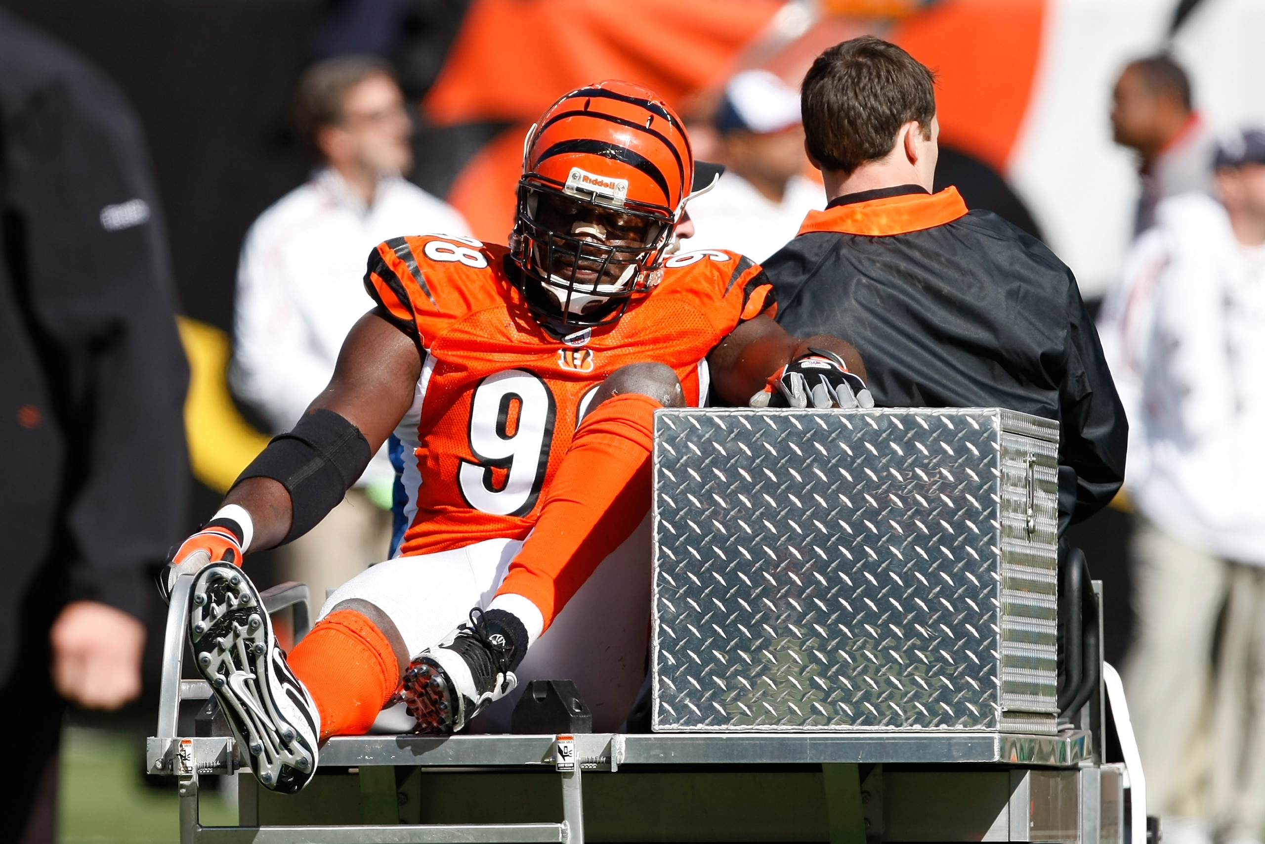 CINCINNATI, OH - OCTOBER 18: Defensive end Antwan Odem #98 of the Cincinnati Bengals is taken off the field on a cart after an injury against the Houston Texans at Paul Brown Stadium on October 18, 2009 in Cincinnati, Ohio. (Photo by Scott Boehm/Getty Ima