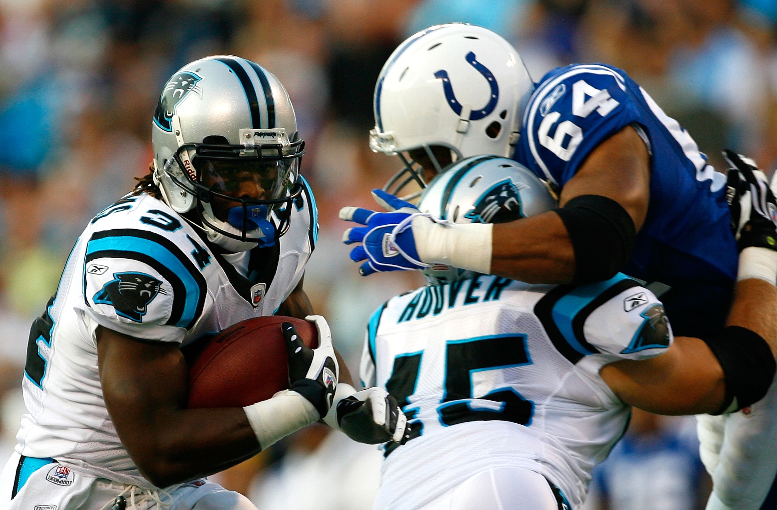 CHARLOTTE, NC - AUGUST 09: Running back DeAngelo Williams #34 of the Carolina Panthers rushes upfield against the Indianapolis Colts during their game at Bank of America Stadium on August 9, 2008 in Charlotte, North Carolina. (Photo by Kevin C. Cox/Gett CHARLOTTE, NC - AUGUST 09: Running back DeAngelo Williams #34 of the Carolina Panthers rushes upfield against the Indianapolis Colts during their game at Bank of America Stadium on August 9, 2008 in Charlotte, North Carolina. (Photo by Kevin C. Cox/Gett
