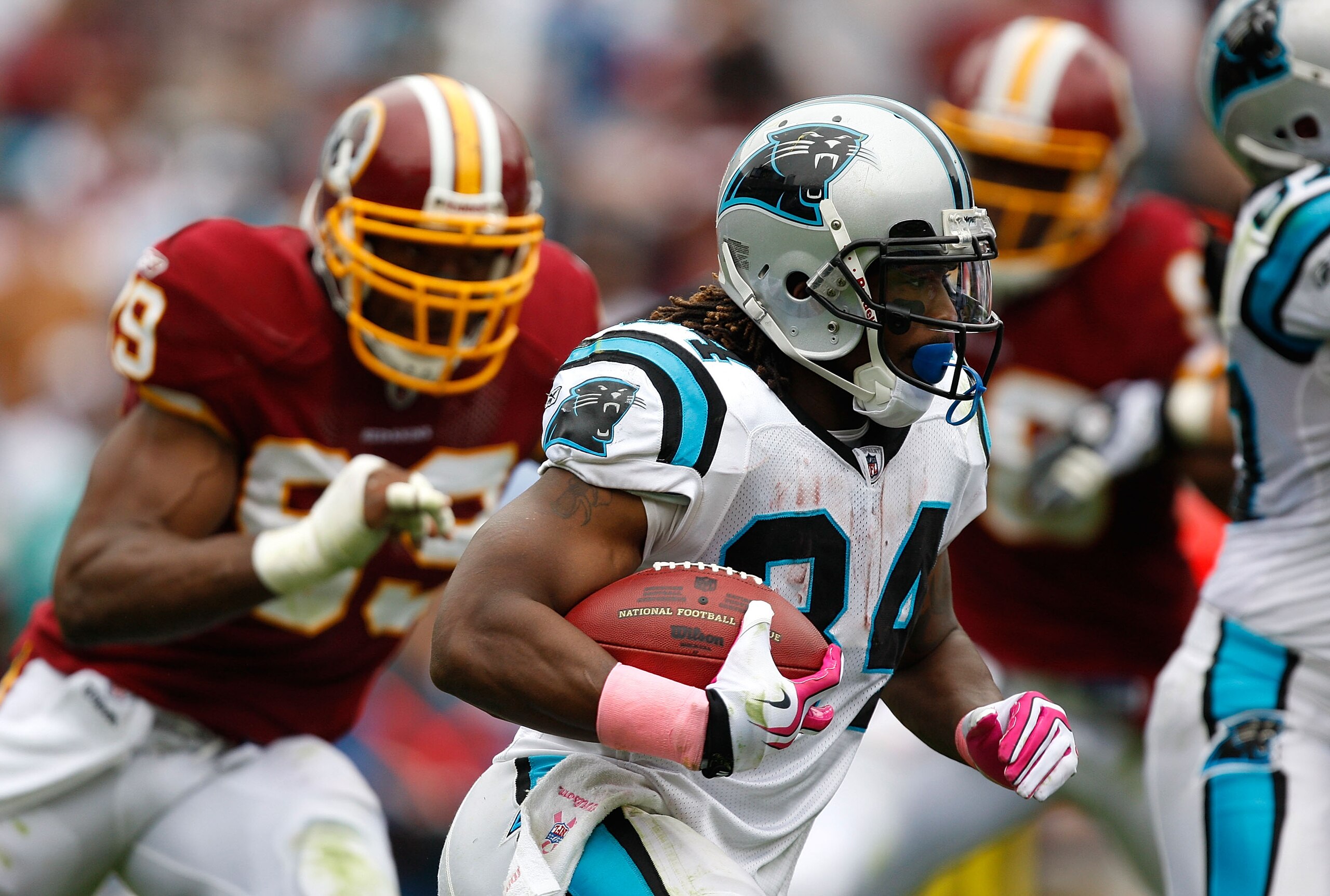 CHARLOTTE, NC - OCTOBER 11: DeAngelo Williams #34 of the Carolina Panthers runs with the ball against the Washington Redskins at Bank of America Stadium on October 11, 2009 in Charlotte, North Carolina. (Photo by Streeter Lecka/Getty Images) CHARLOTTE, NC - OCTOBER 11: DeAngelo Williams #34 of the Carolina Panthers runs with the ball against the Washington Redskins at Bank of America Stadium on October 11, 2009 in Charlotte, North Carolina. (Photo by Streeter Lecka/Getty Images)