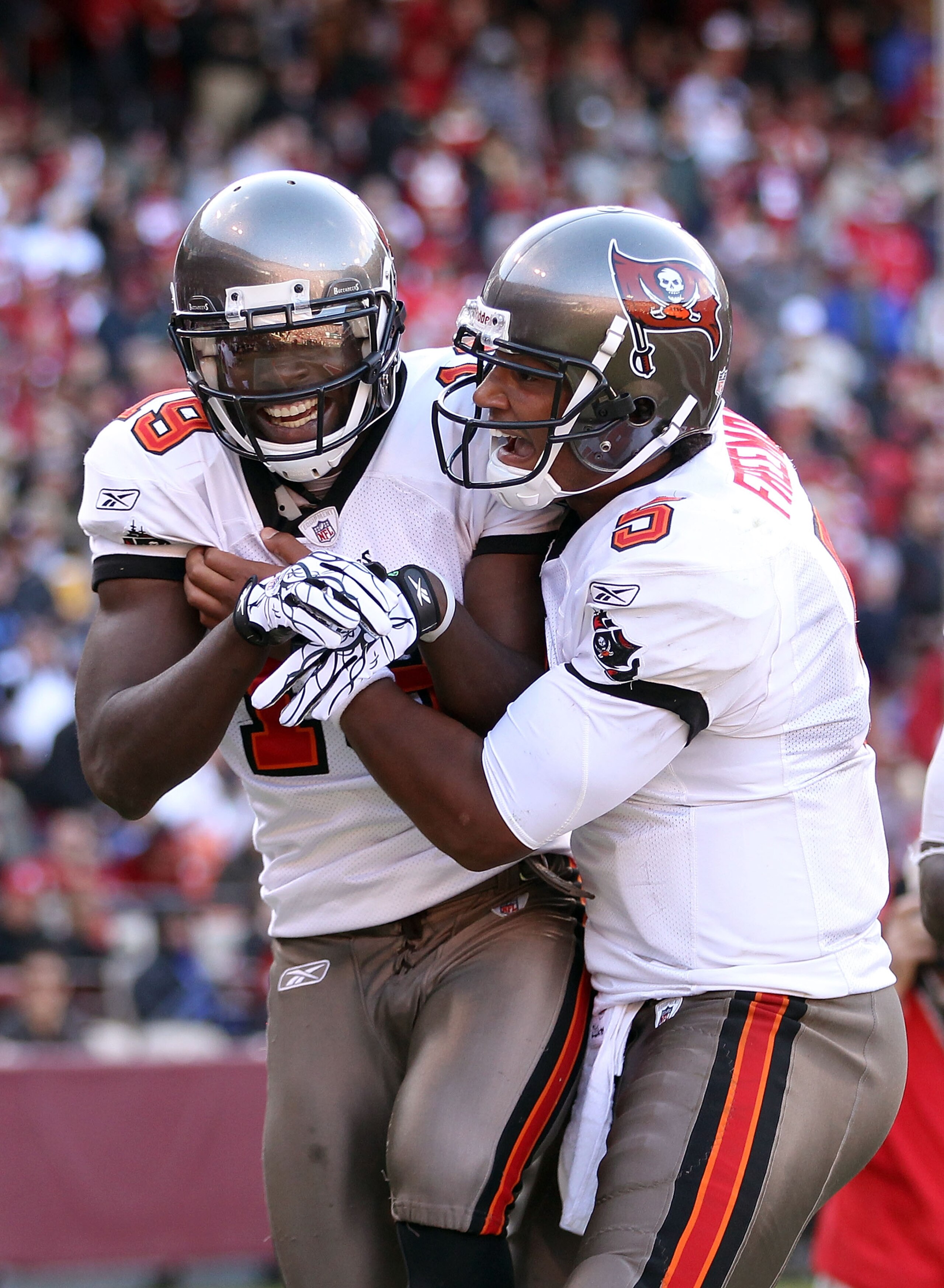 SAN FRANCISCO - NOVEMBER 21: Mike Williams #19 of the Tampa Bay Buccaneers is congratulated by Josh Freeman #5 after he scored a touchdown against the San Francisco 49ers at Candlestick Park on November 21, 2010 in San Francisco, California. (Photo by E SAN FRANCISCO - NOVEMBER 21: Mike Williams #19 of the Tampa Bay Buccaneers is congratulated by Josh Freeman #5 after he scored a touchdown against the San Francisco 49ers at Candlestick Park on November 21, 2010 in San Francisco, California. (Photo by E