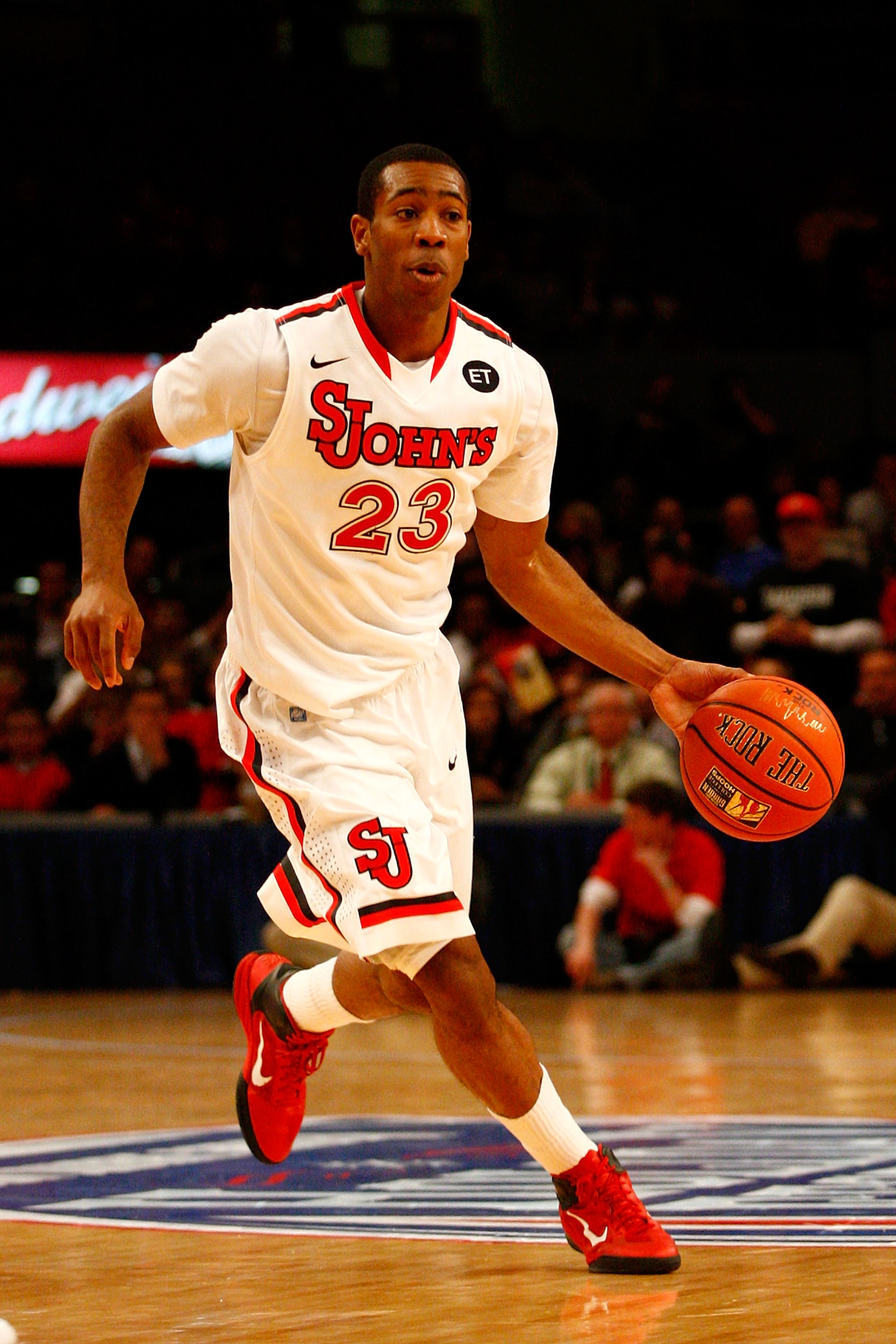 NEW YORK, NY - DECEMBER 20:  Paris Horne #23 of the St. John's Red Storm drives against the Davidson Wildcats during the Madison Square Garden Holiday Festival at Madison Square Garden on December 20, 2010 in New York City.  (Photo by Chris Chambers/Getty