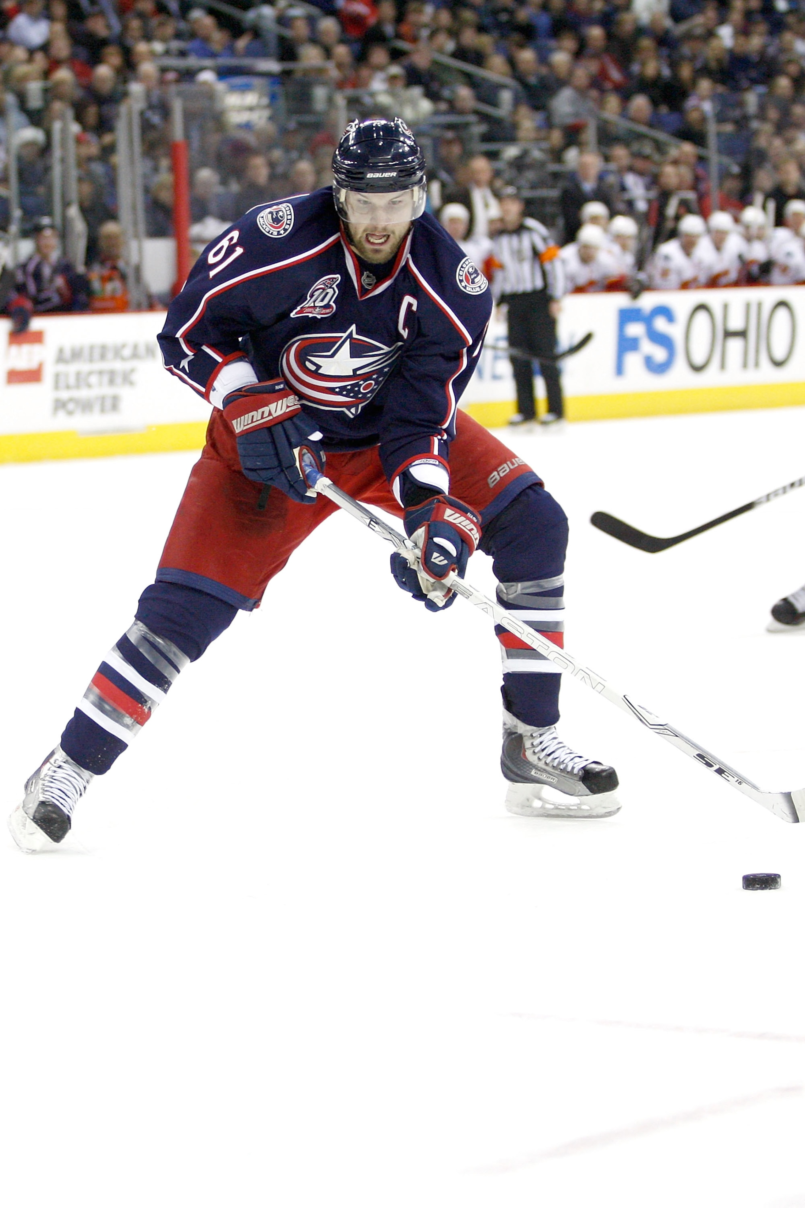 COLUMBUS, OH - DECEMBER 21:  Rick Nash #61 of the Columbus Blue Jackets skates with the puck during a game against the Calgary Flames on December 21, 2010 at Nationwide Arena in Columbus, Ohio.  (Photo by John Grieshop/Getty Images)