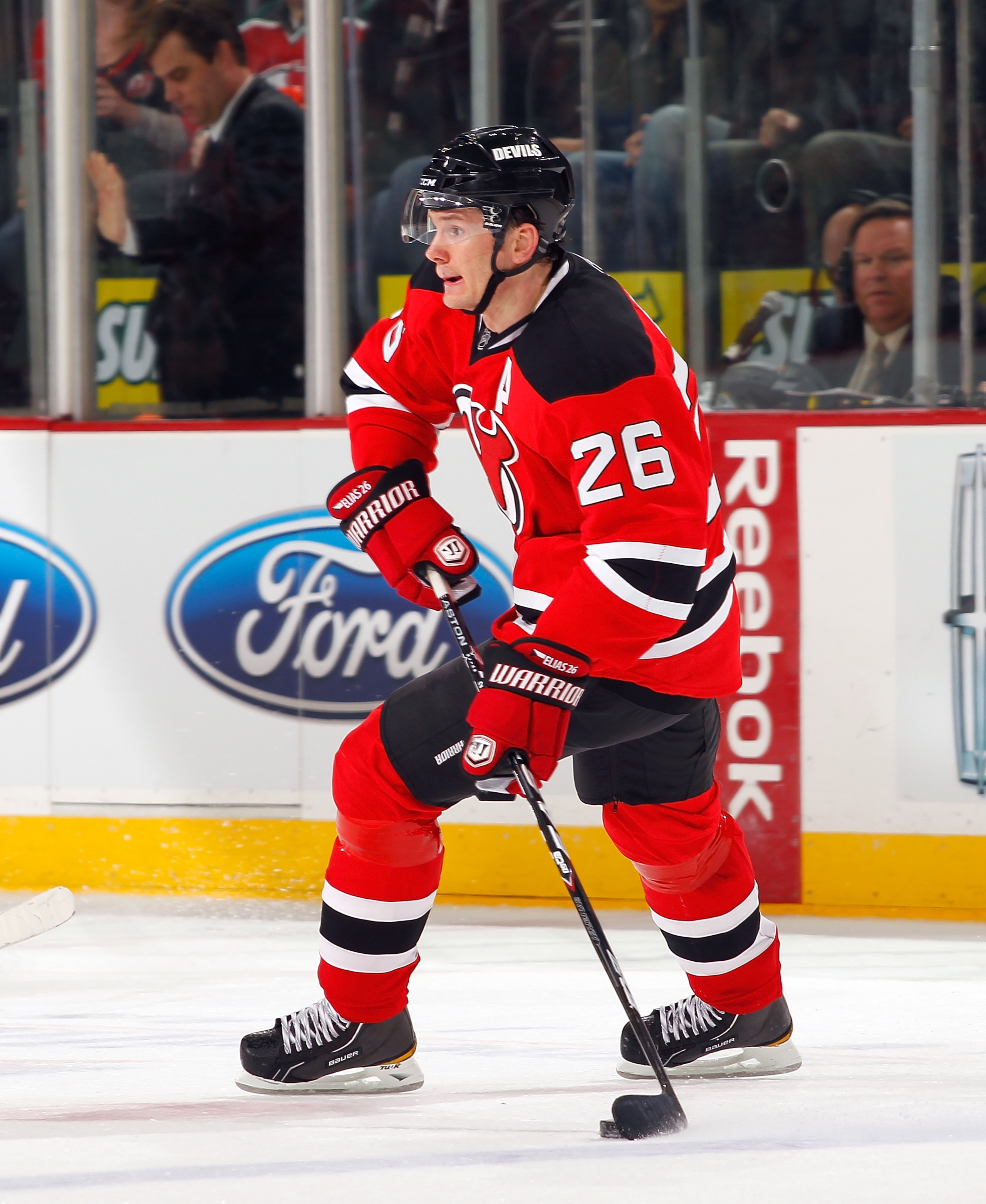 NEWARK, NJ - DECEMBER 29:  Patrik Elias #26 of the New Jersey Devils skates with the puck during a game against the New York Rangers on December 29, 2010 at the Prudential Center in Newark, New Jersey. The Rangers won 3-1.  (Photo by Lou Capozzola/Getty I
